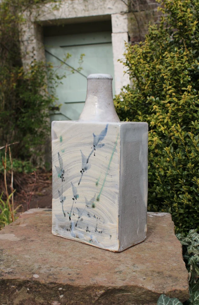 Slab sided bottle, brushed slip, cobalt grasses by Jim Malone