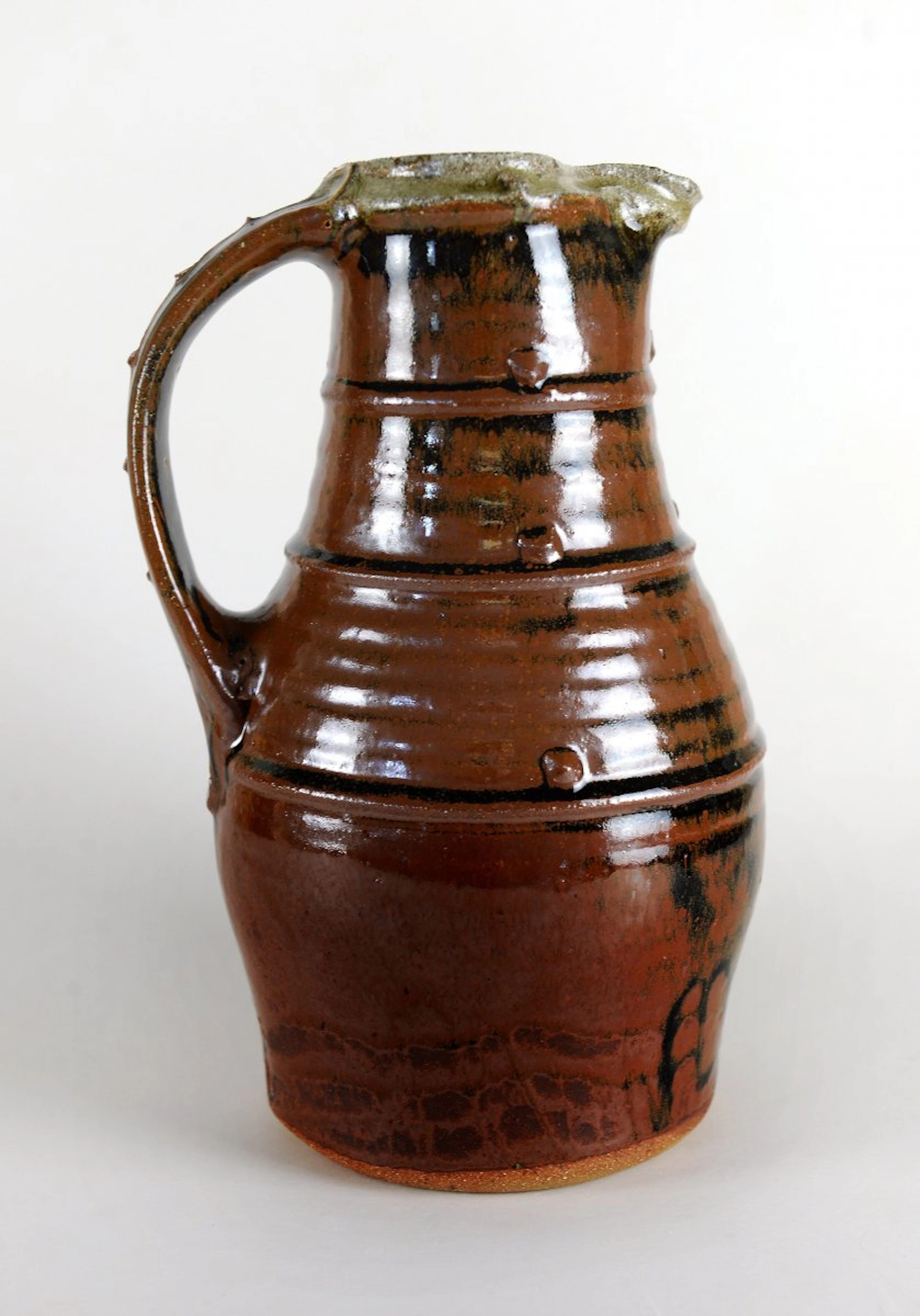 Baluster jug, bands and pellets, tenmoku and ash glazes by Jim Malone
