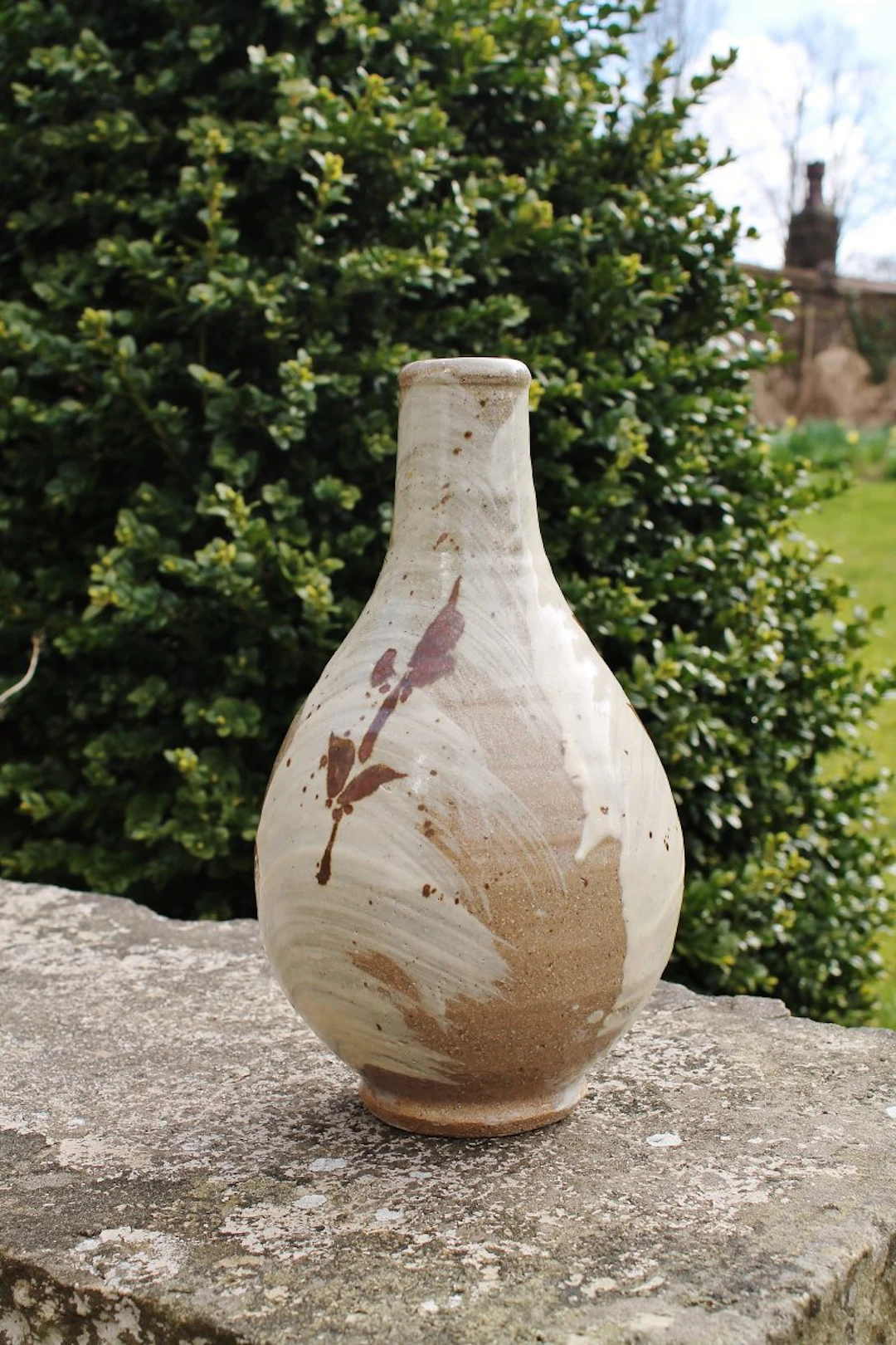 Korean type footed bottle, brushed slip, iron motif by Jim Malone