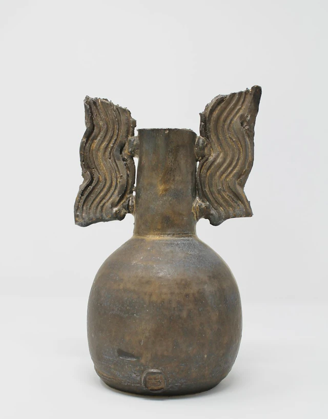 Bronze glaze winged vase by Colin Pearson