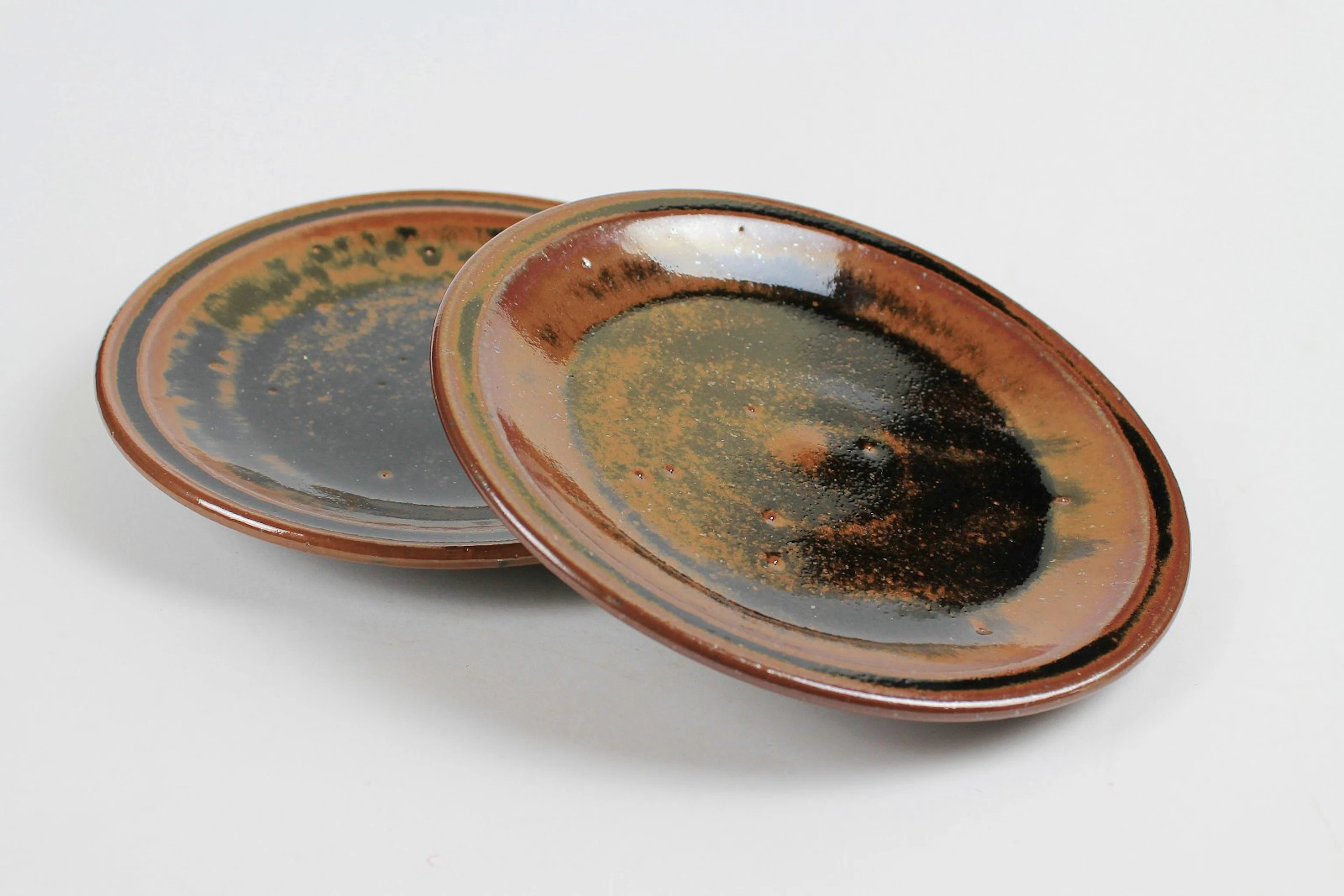 Pair of tenmoku dishes by Edward Hughes