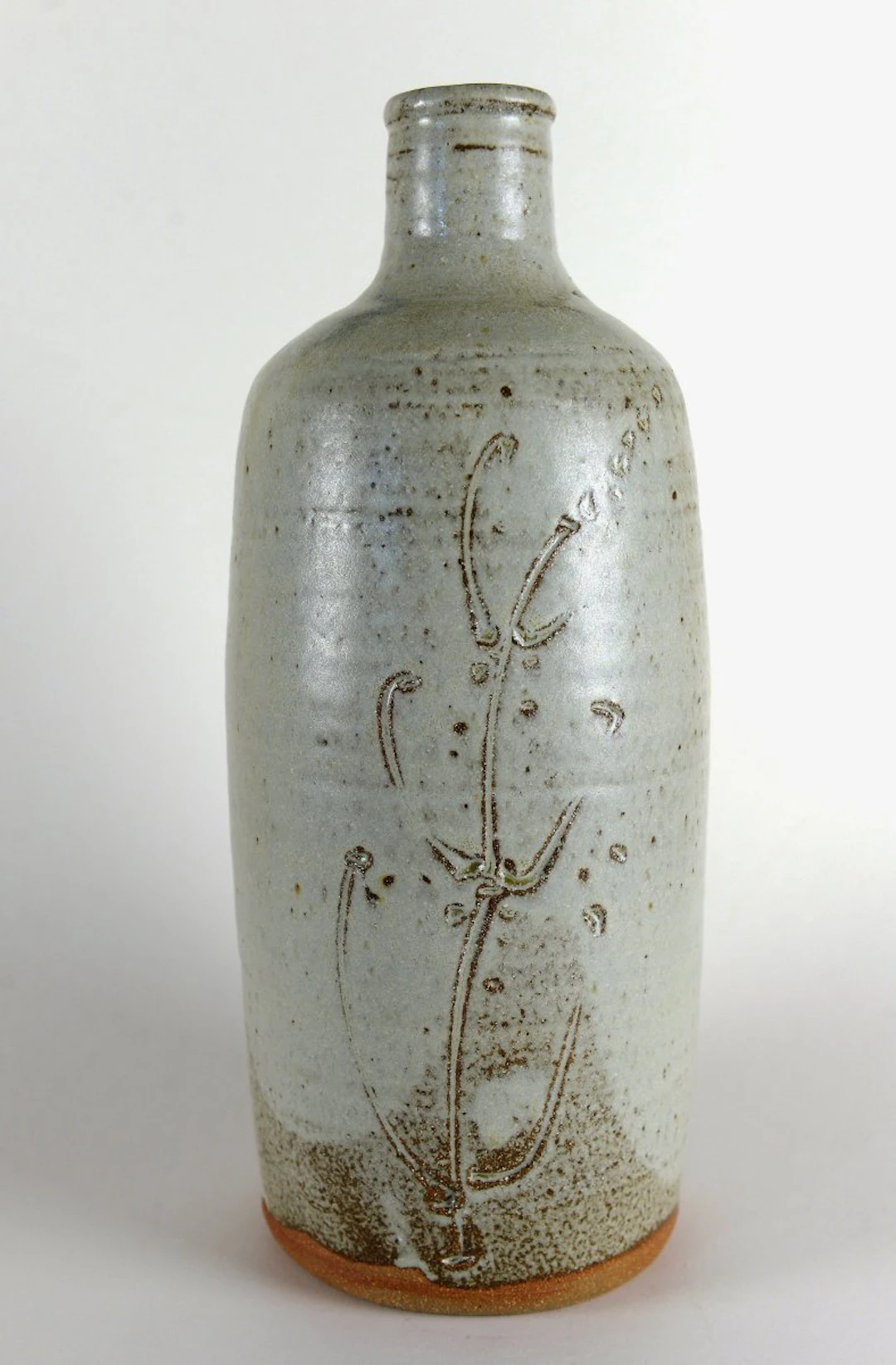 Cylinder bottle, engraved grasses, hawthorn ash glaze by Jim Malone