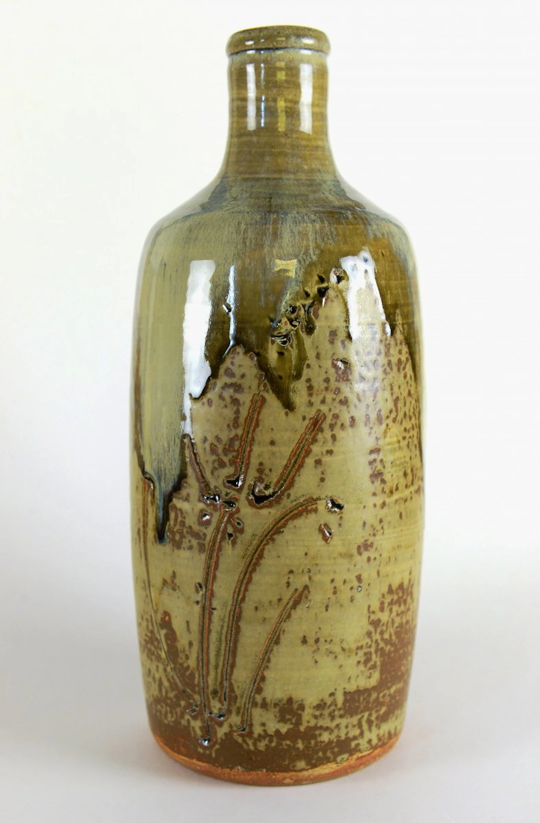Cylinder bottle, engraved grasses, granite and nuka glaze by Jim Malone