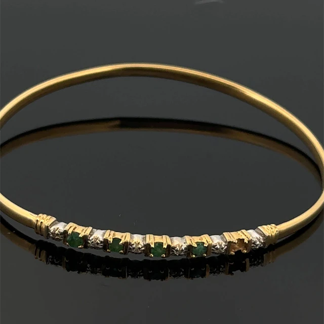 Delicate rigid bangle in yellow and white gold (750) set wit - Lot 237
