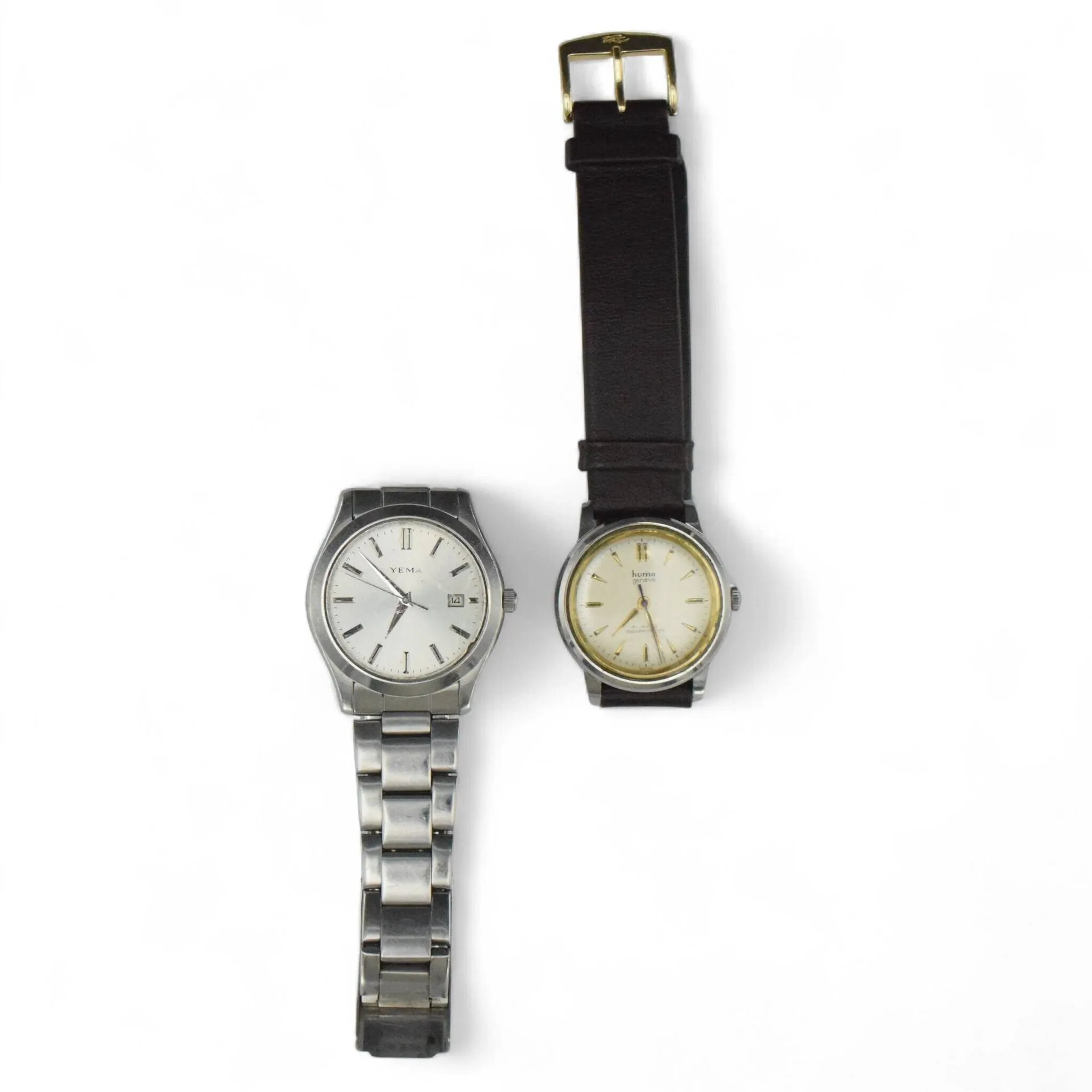 YEMA - HUMA Lot de deux montres bracelets pour homme. Mouvement quartz et mécanique. Vendu en l'état.