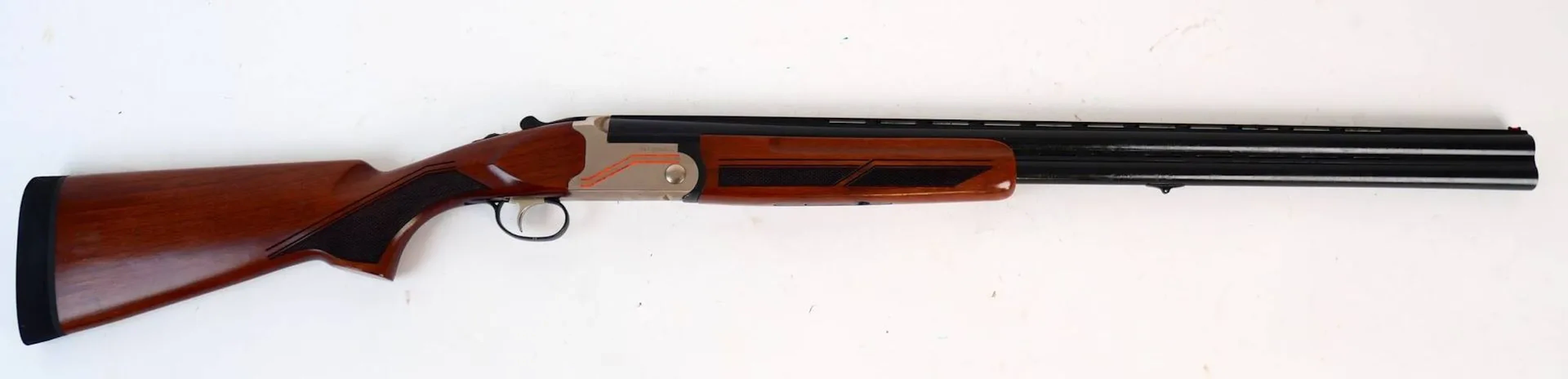 Khan Arms Intégra 12/76-caliber shotgun (No. 15-121202). 71- - Lot 70