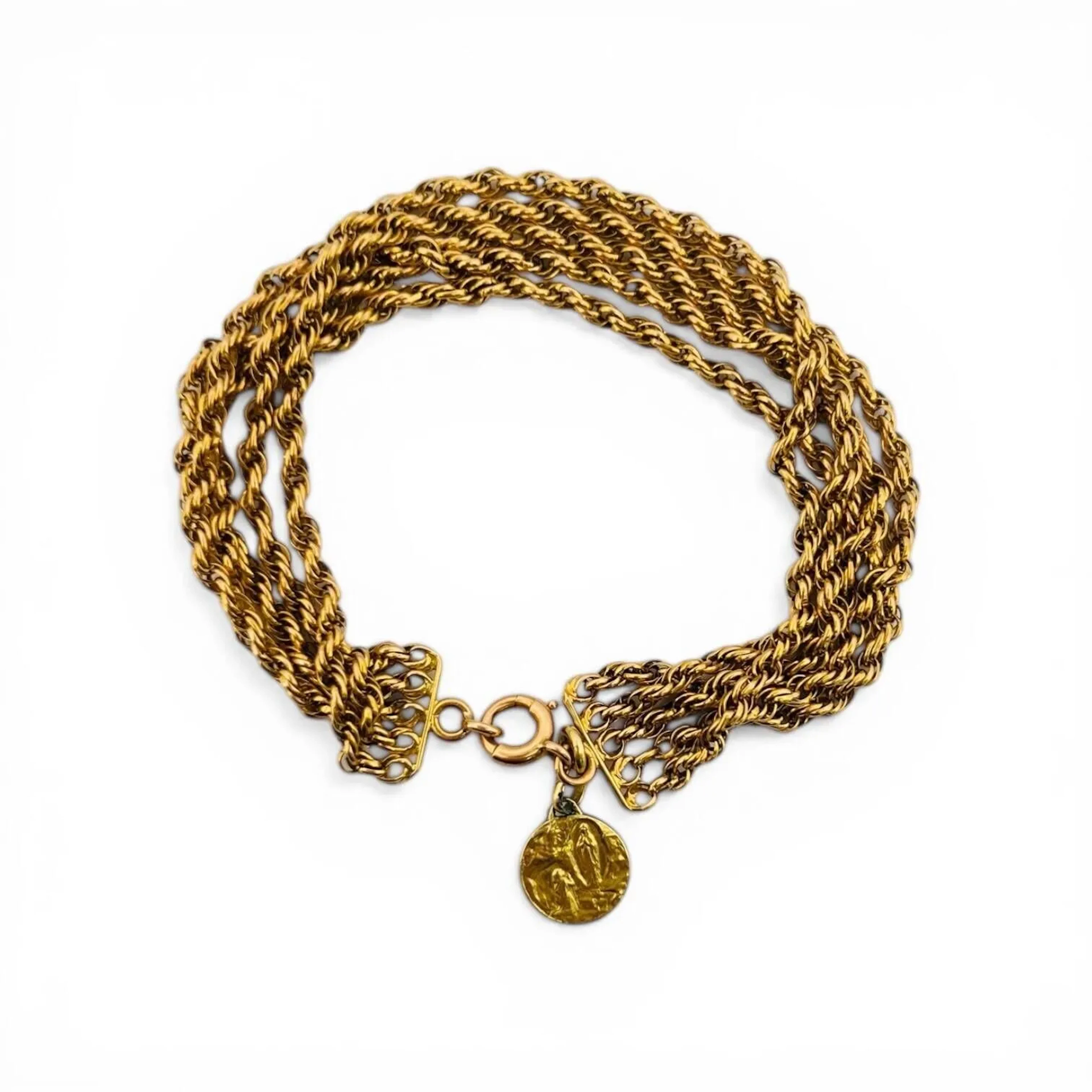 A five-row corded bracelet in 18k (750) yellow gold. A small - Lot 367