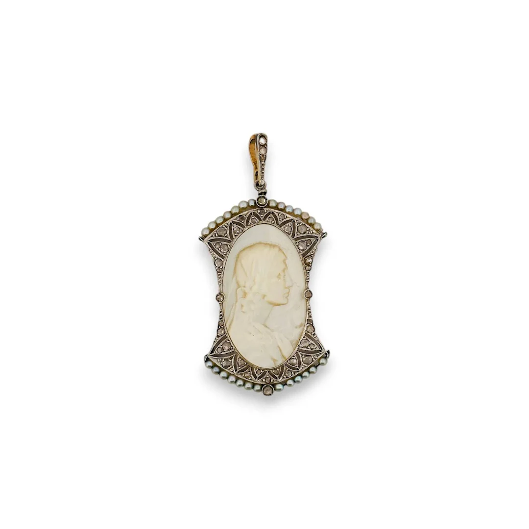 A pendant made of 14K yellow gold (585) and platinum (850), - Lot 330