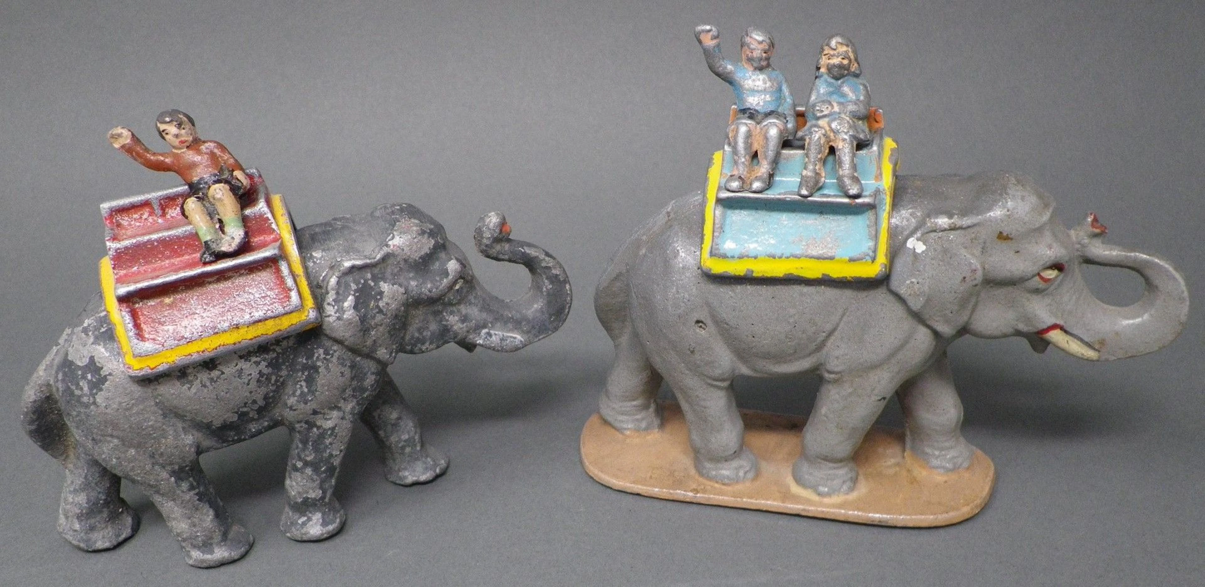 QUIRALU - Le cirque Eléphant avec des enfants assis sur le houda : - éléphant avec terrasse, avec ses deux enfants mais sans son cornac - éléphant sans terrasse, avec l'un deux enfants et sans son cornac Le premier reproduit p. 205 - Bibliographie : Les jouets Quiralu 1933-1964 - R. Alazet - J. Borsarello - H. Giroud - Ed° J. Granchet Paris. Jouets anciens pouvant présenter des manques de peinture, des chocs ou des manques, y compris pour les conditionnements éventuels. Vendus en l'état et sans réclamations.