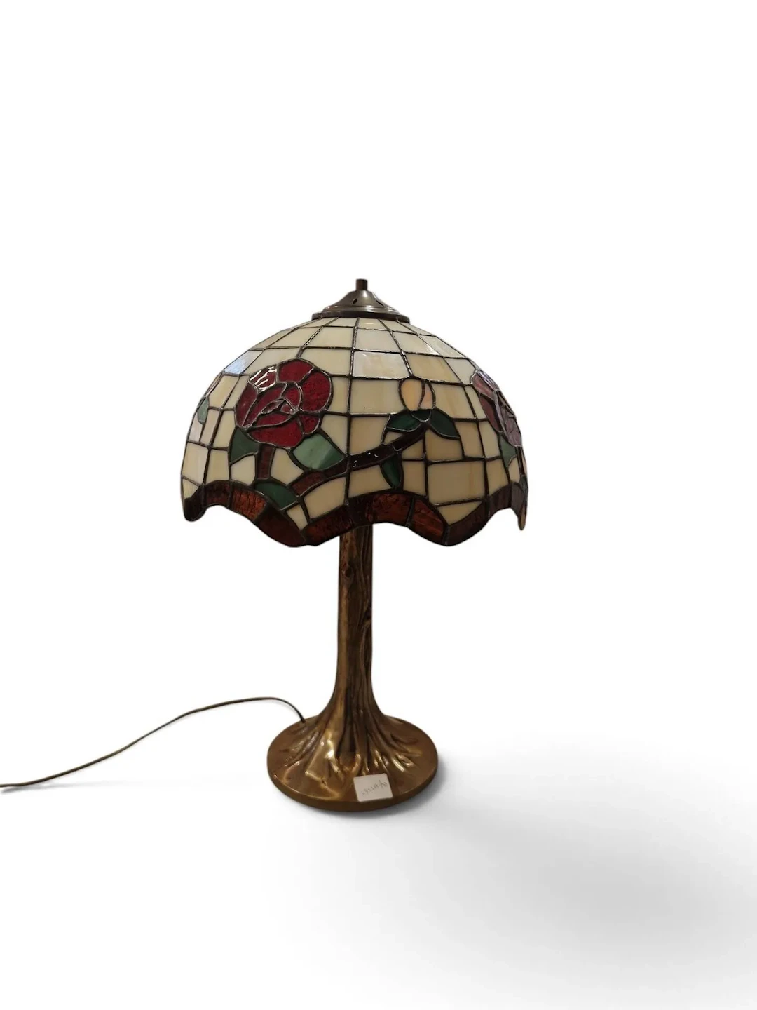 Tiffany-style table lamp, with a patinated metal base shaped - Lot 57
