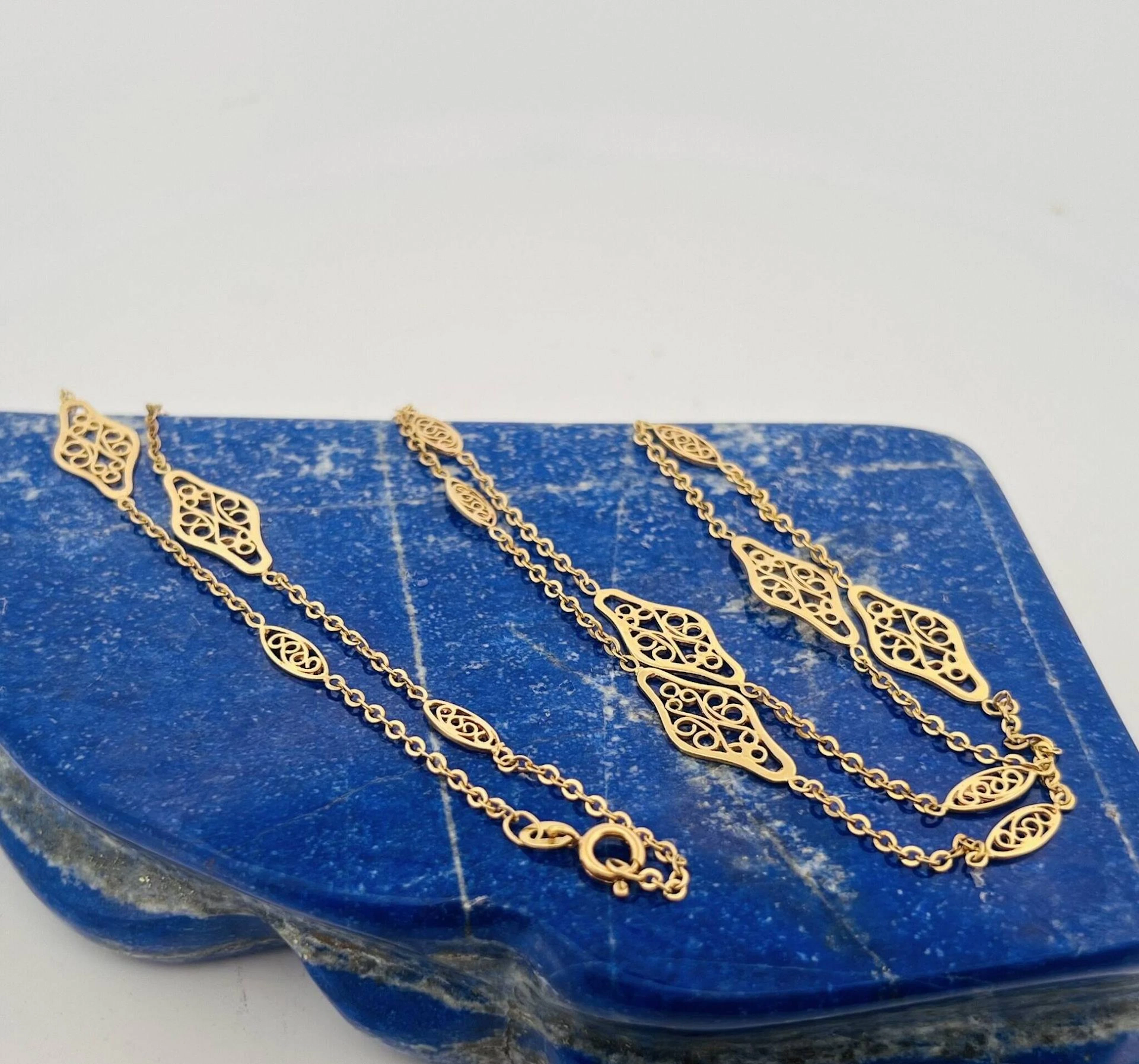 14k yellow gold (585) necklace with oval or four-lobed filig - Lot 179