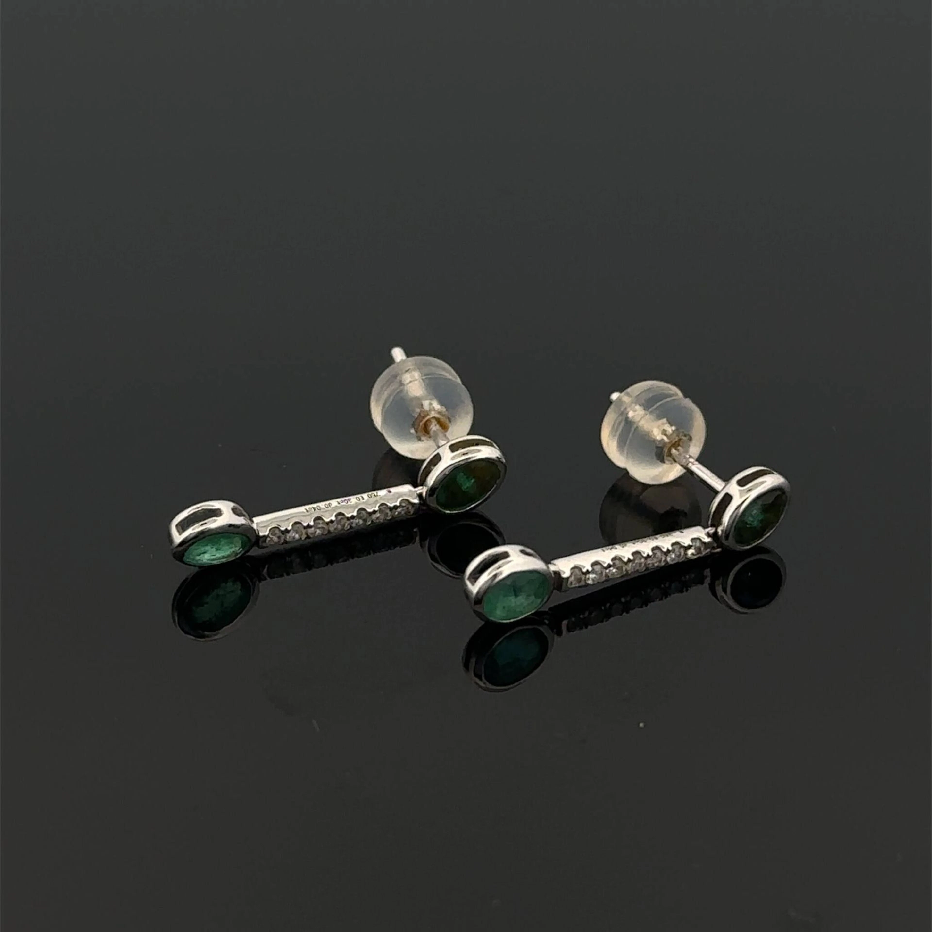 Pair of "Ligne" white gold (750) earrings set with two emera - Lot 313