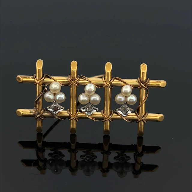Openwork "trellis" brooch in yellow gold (750), engraved wit - Lot 248