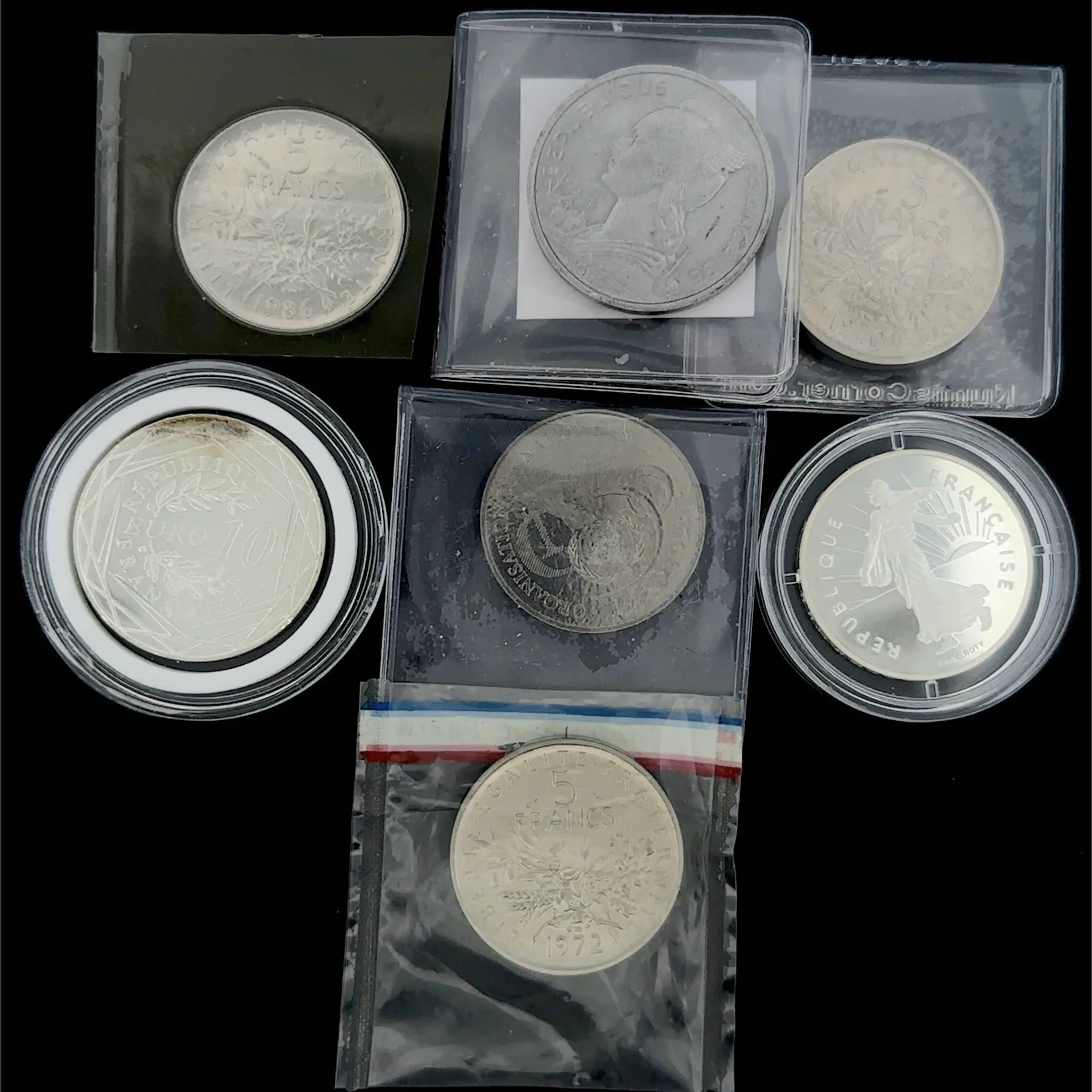 Set of 7 coins: - Lot 151