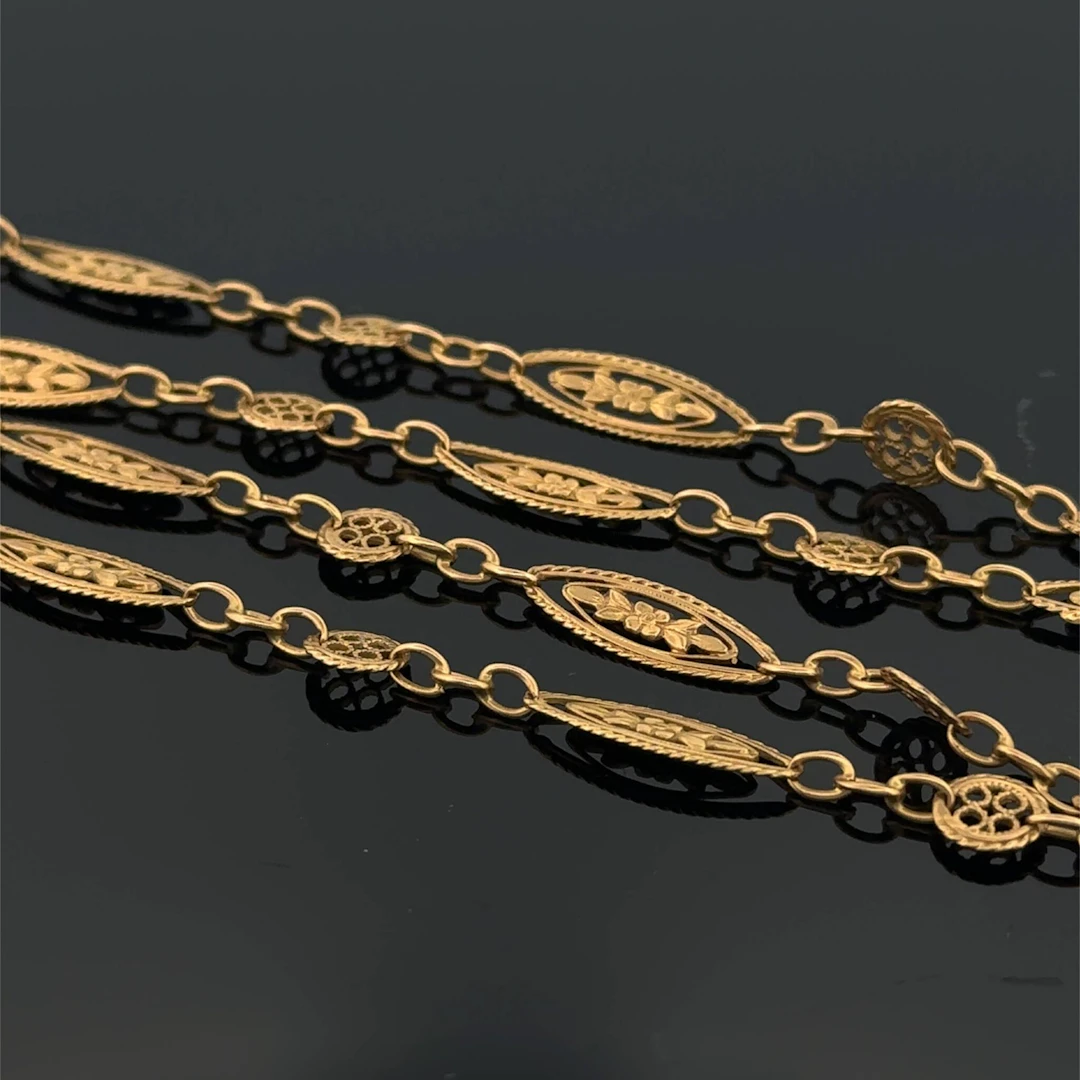 Long yellow gold (750) necklace with circular links and open - Lot 251