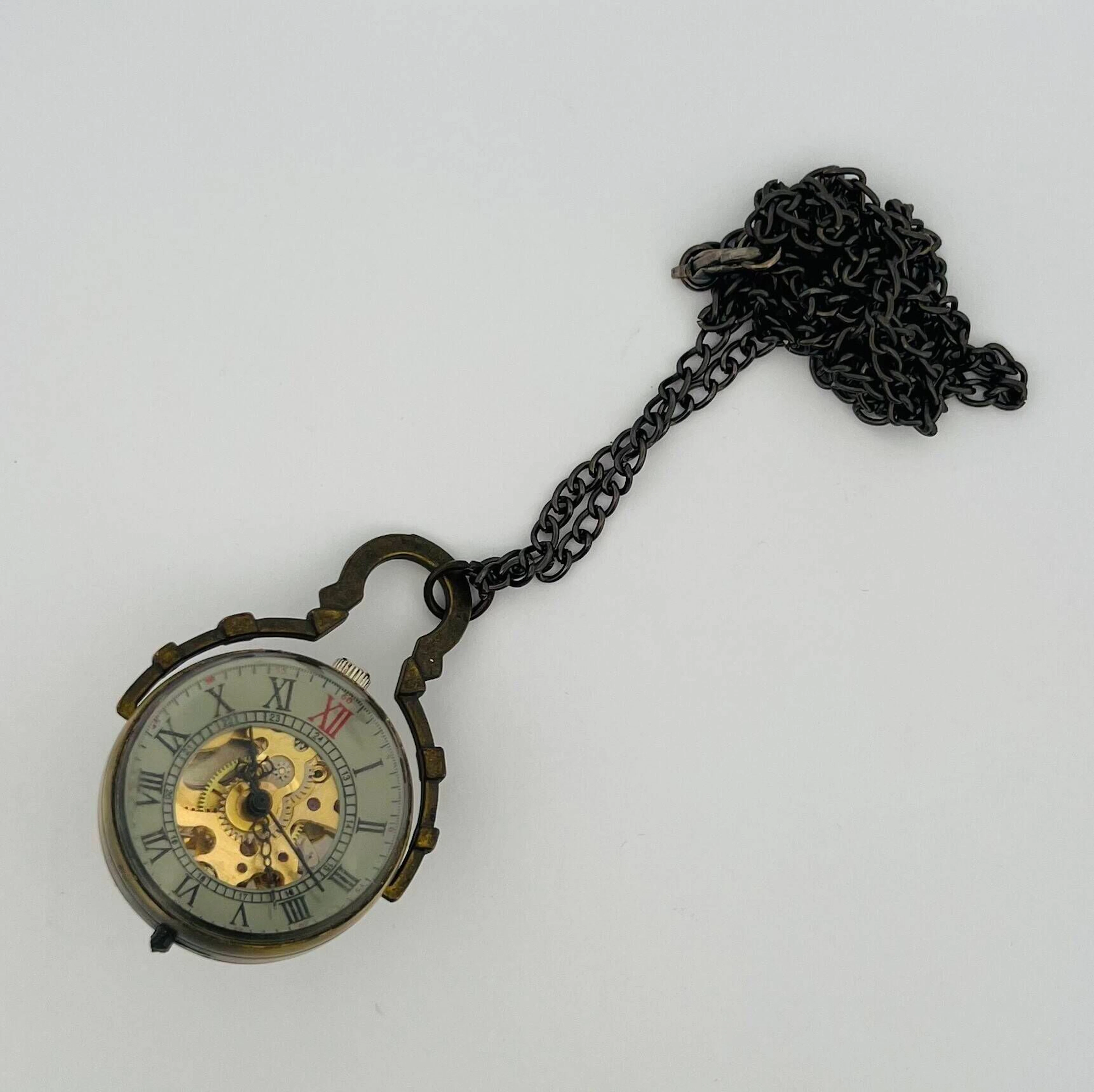 Watch with a glass ball-shaped pendant, metal case, black Ro - Lot 232