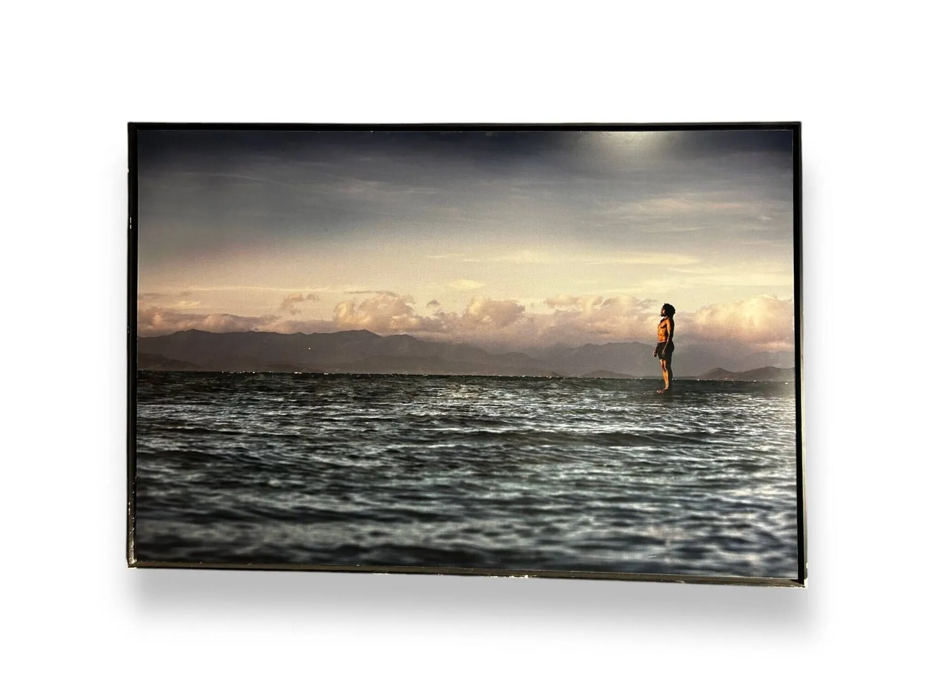 Large photographic print of Christian Karambeu facing the se - Lot 128