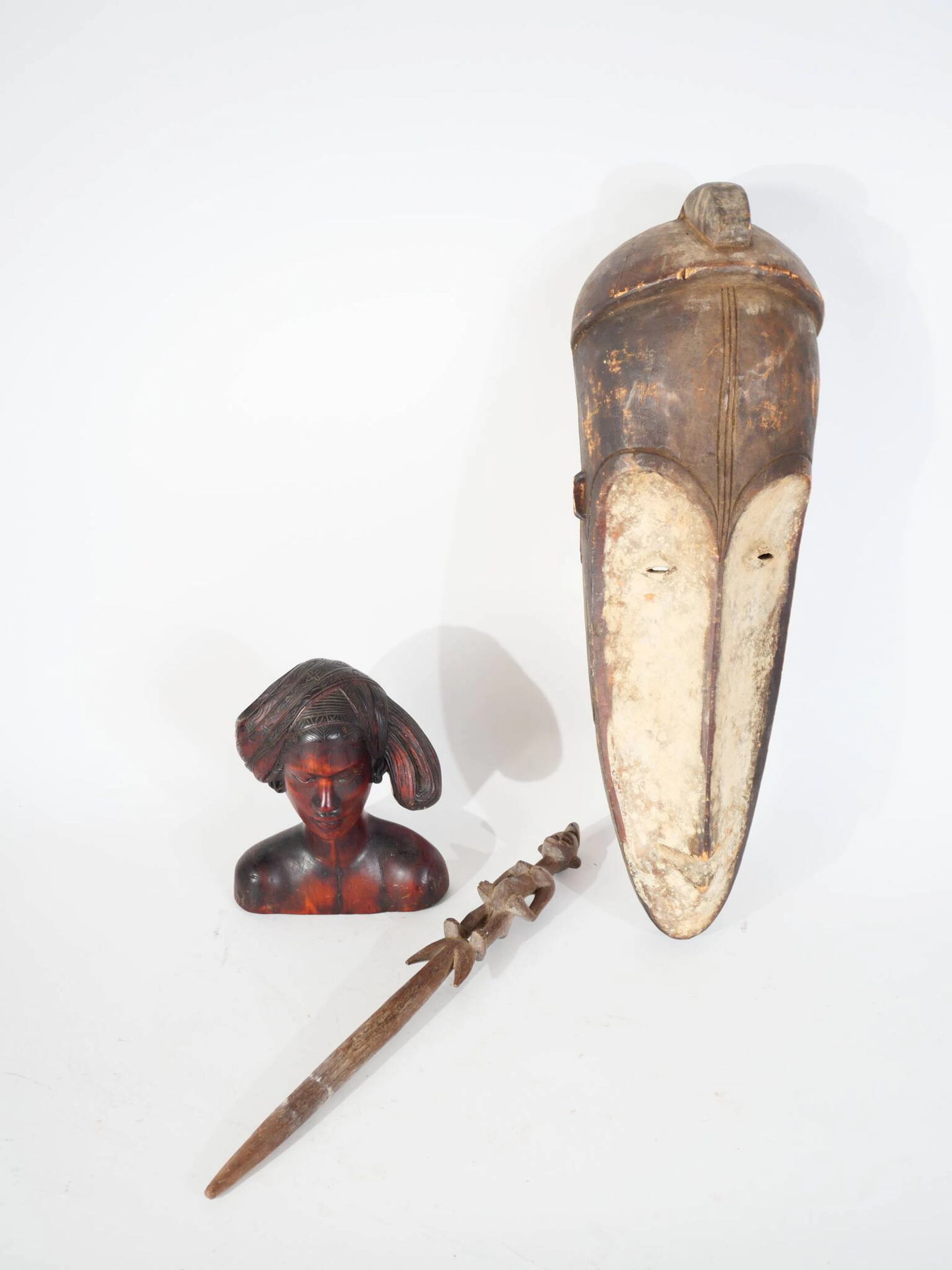 A collection of souvenirs from trips to Africa, including - Lot 42