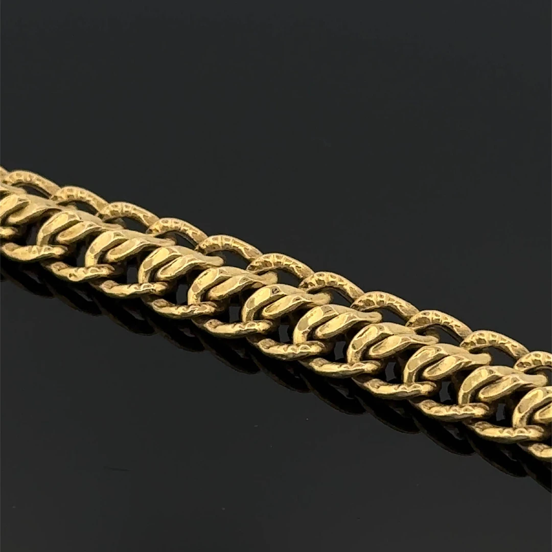 Yellow and white gold (750) bracelet with an American link d - Lot 236