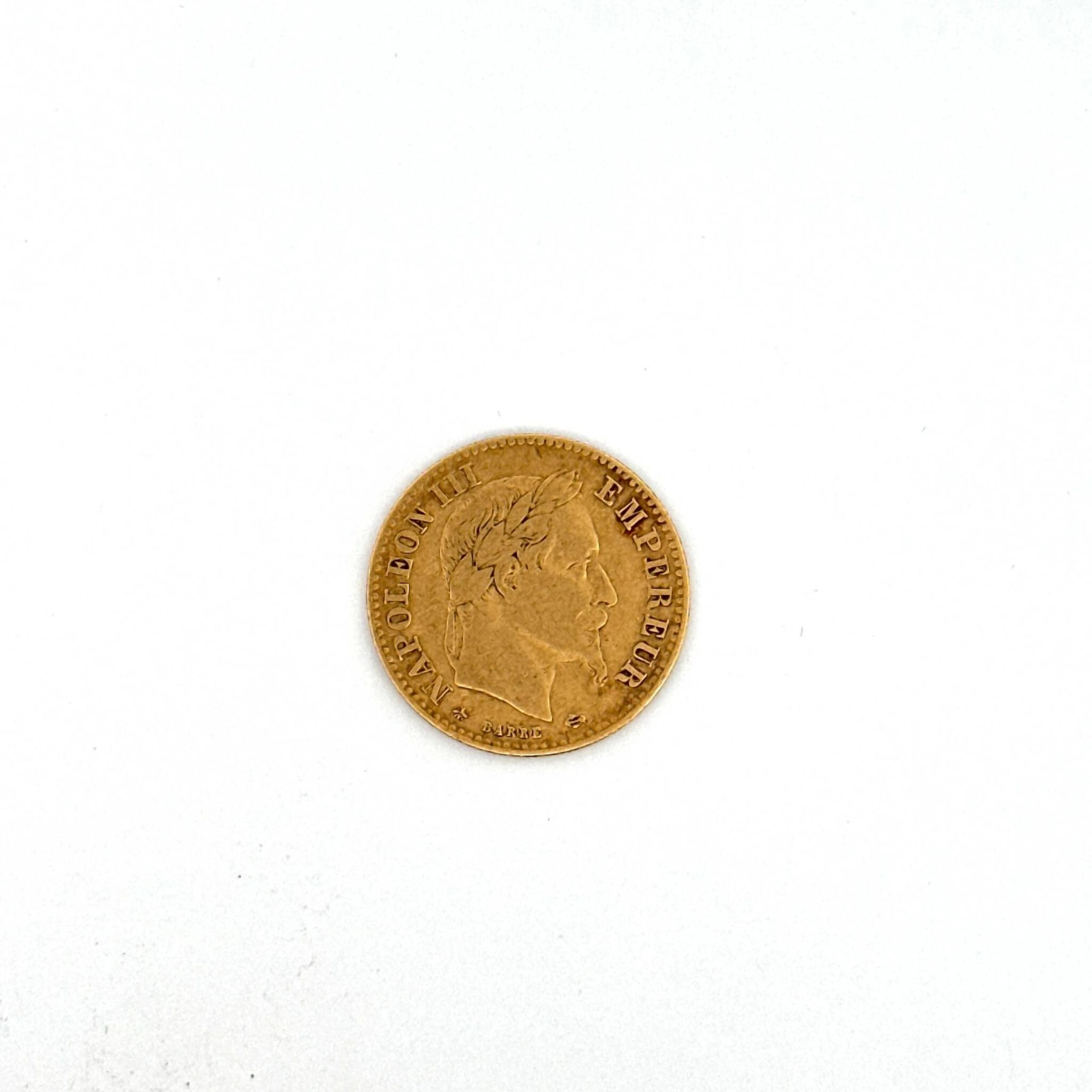 1862 Napoleon III 10-franc gold coin with laureate head. - Lot 175