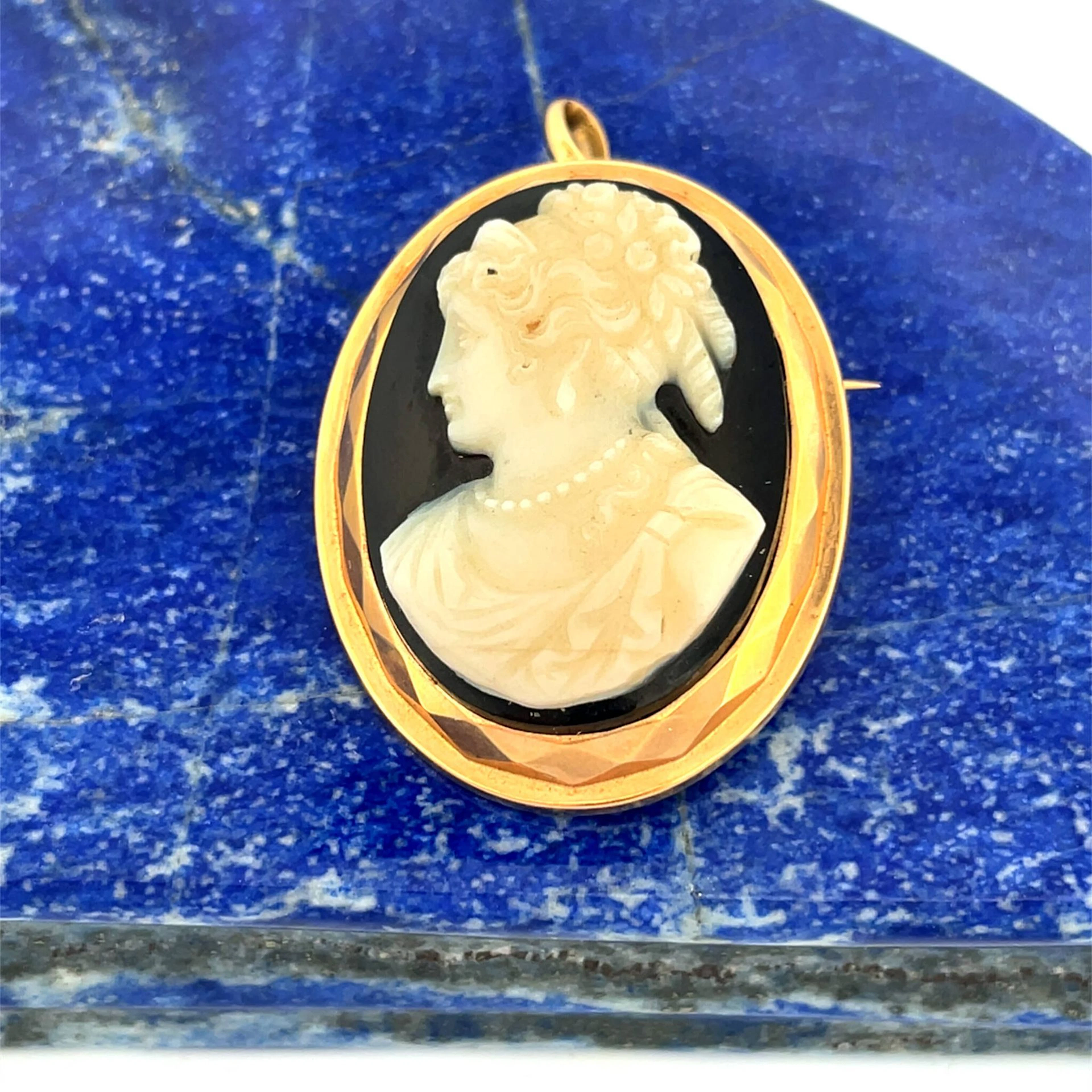 Faceted rose gold (750) brooch and pendant, adorned with an - Lot 138