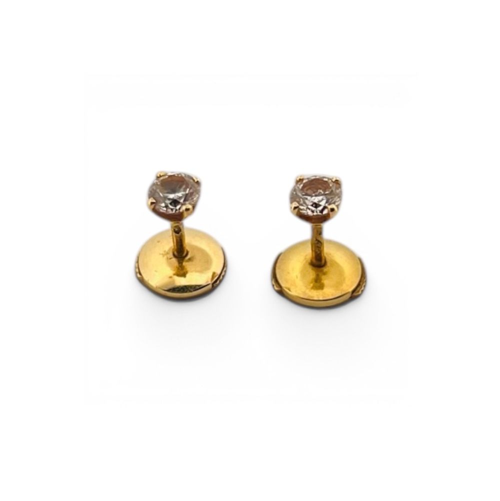 Pair of 18K (750) yellow gold stud earrings, each set with a - Lot 267