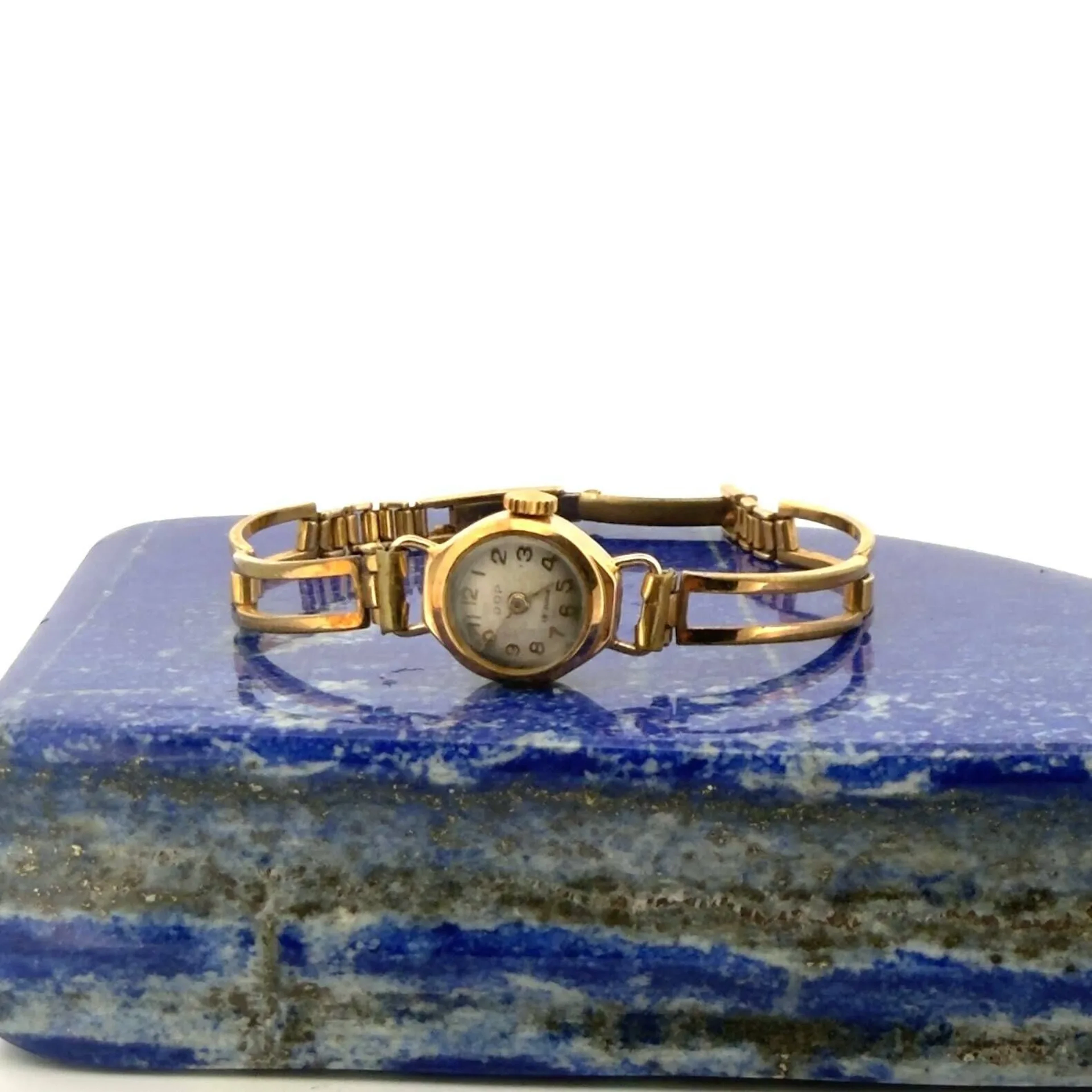 Round ladies' watch in yellow gold (750). Cream-colored dial - Lot 323