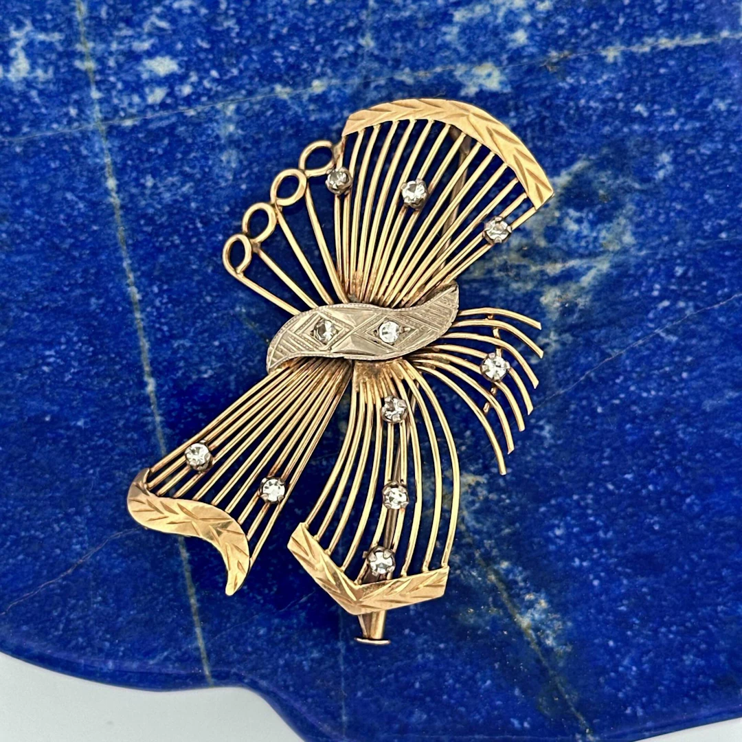 14k yellow gold (585) "bow" brooch, openwork, chiseled, set - Lot 301