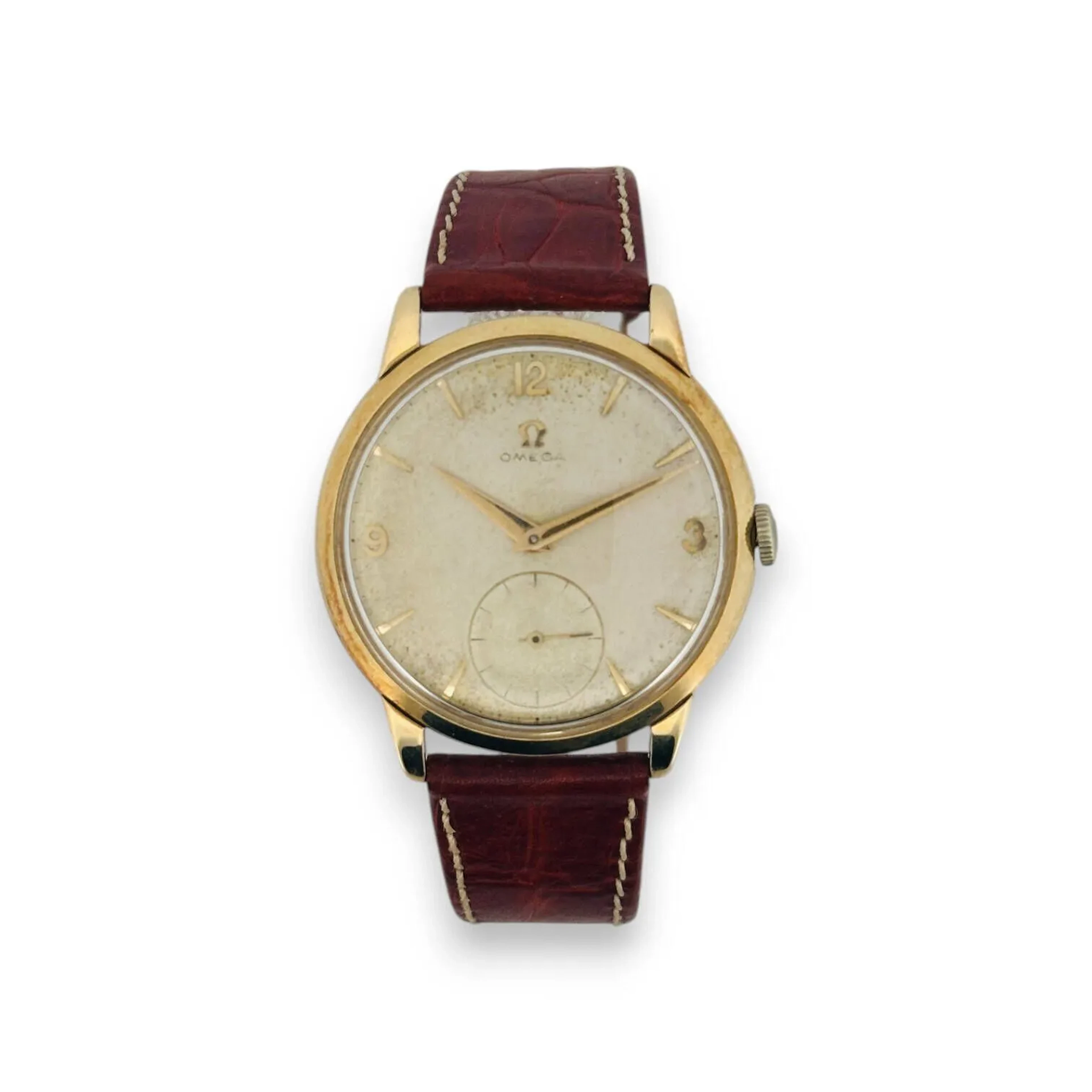 OMEGA Montre bracelet pour homme, cadran champagne (piqué et oxydé), index chiffres arabes et bâtons formant les heures, trotteuse à 6h, mouvement mécanique, bracelet rapporté en cuir marron (peu usé) à boucle ardillon en métal. Conservé dans un écrin. Diam. : 35 mm - Poids brut : 35.28 g. (rayures au verre)