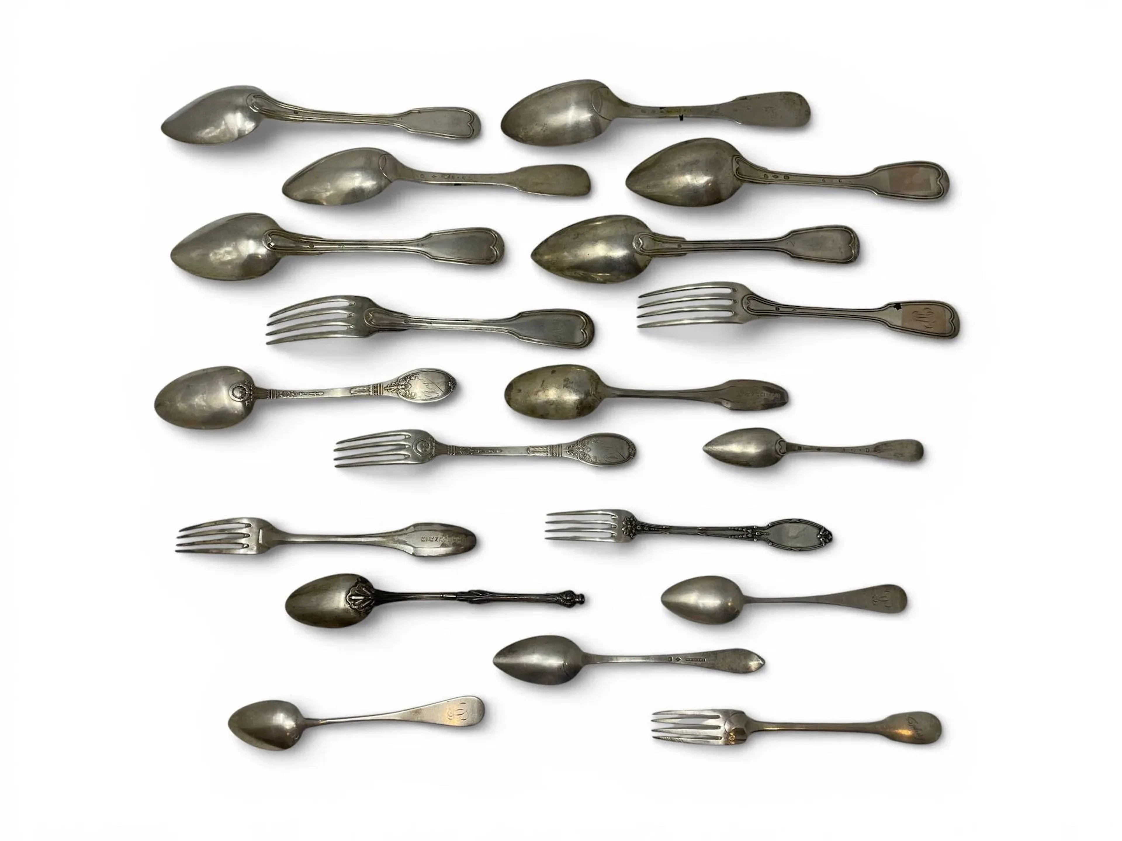 Set of mismatched silver flatware including: - Lot 58