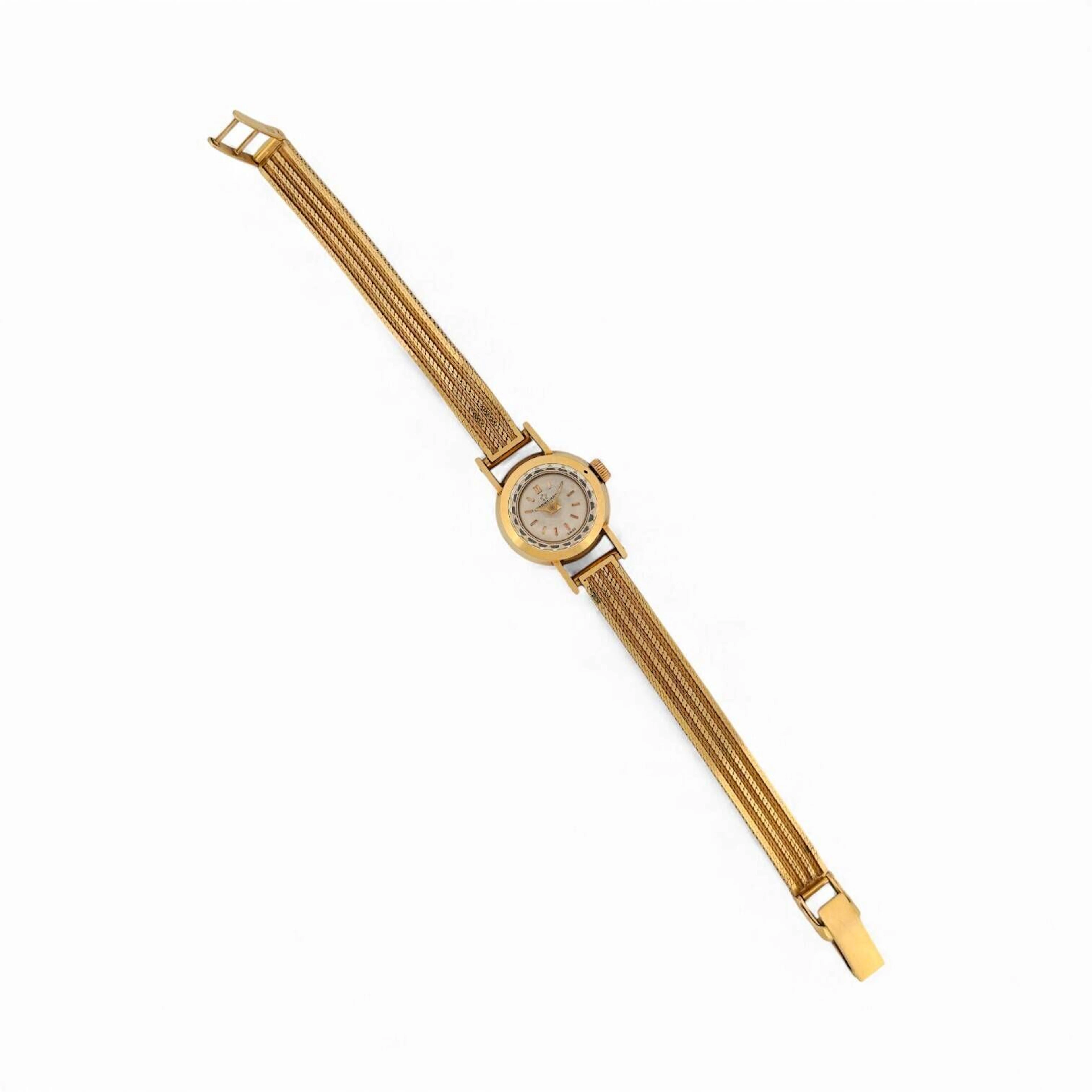 ETERNA MATIC Montre bracelet de dame en or (750), cadran à index appliqués dorés signé, boîtier numéroté 412994. Titre: poinçons tête d'aigle Poids brut: 24,7 gr