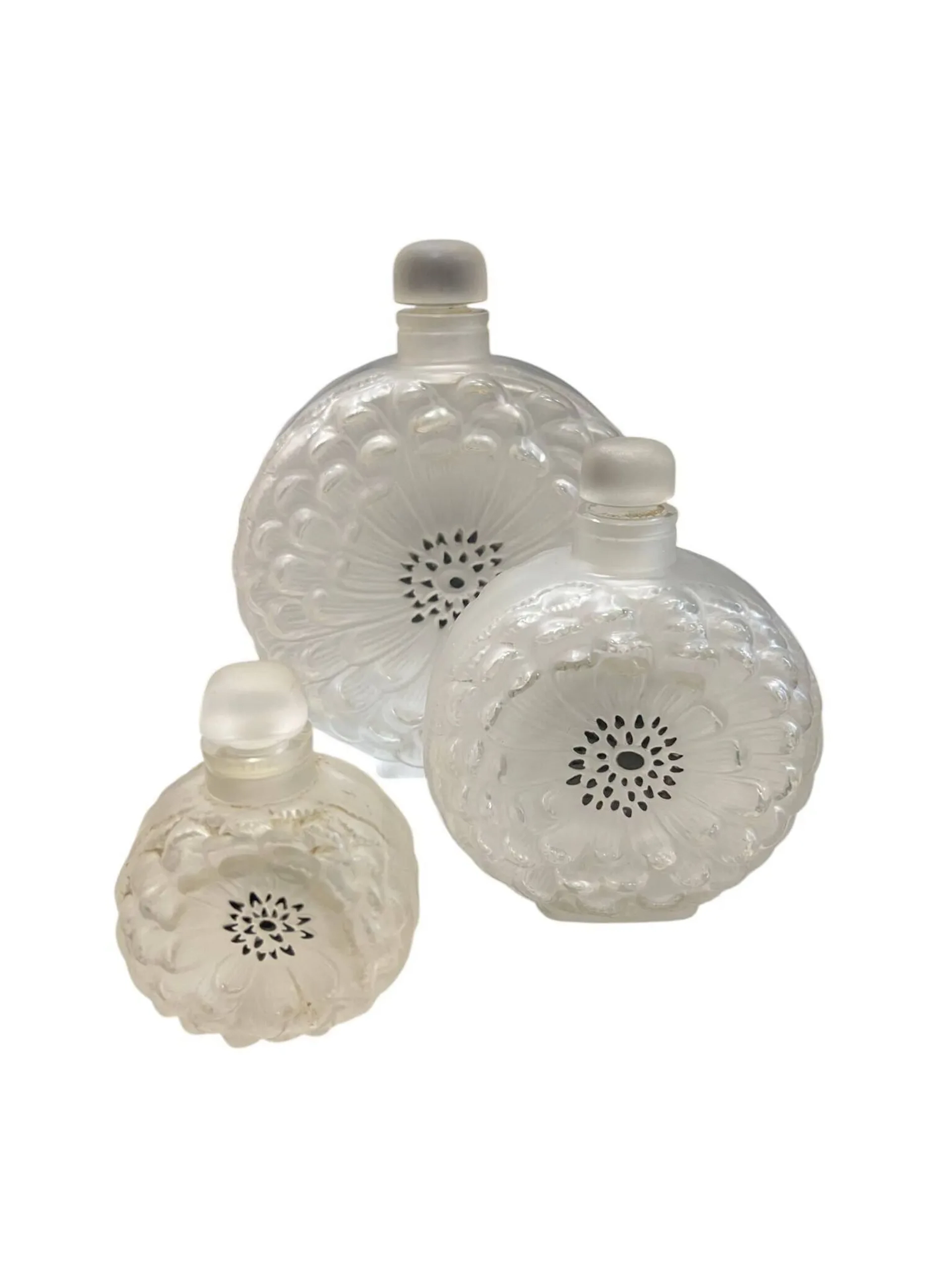 R LALIQUE France - Suite of three "Dahlia" model bottles in - Lot 1411