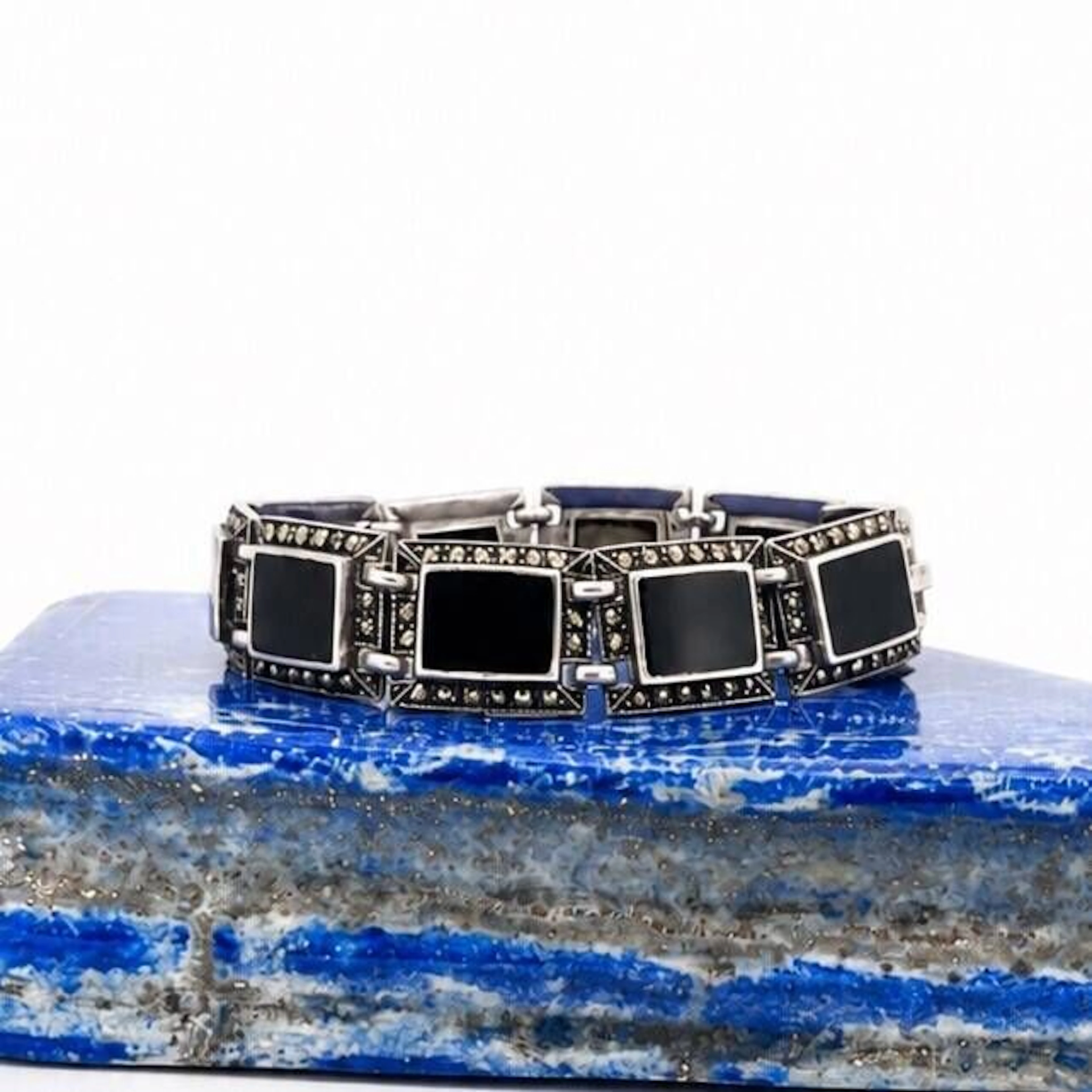 Hinged silver (925) bracelet, adorned with ten rectangular o - Lot 78