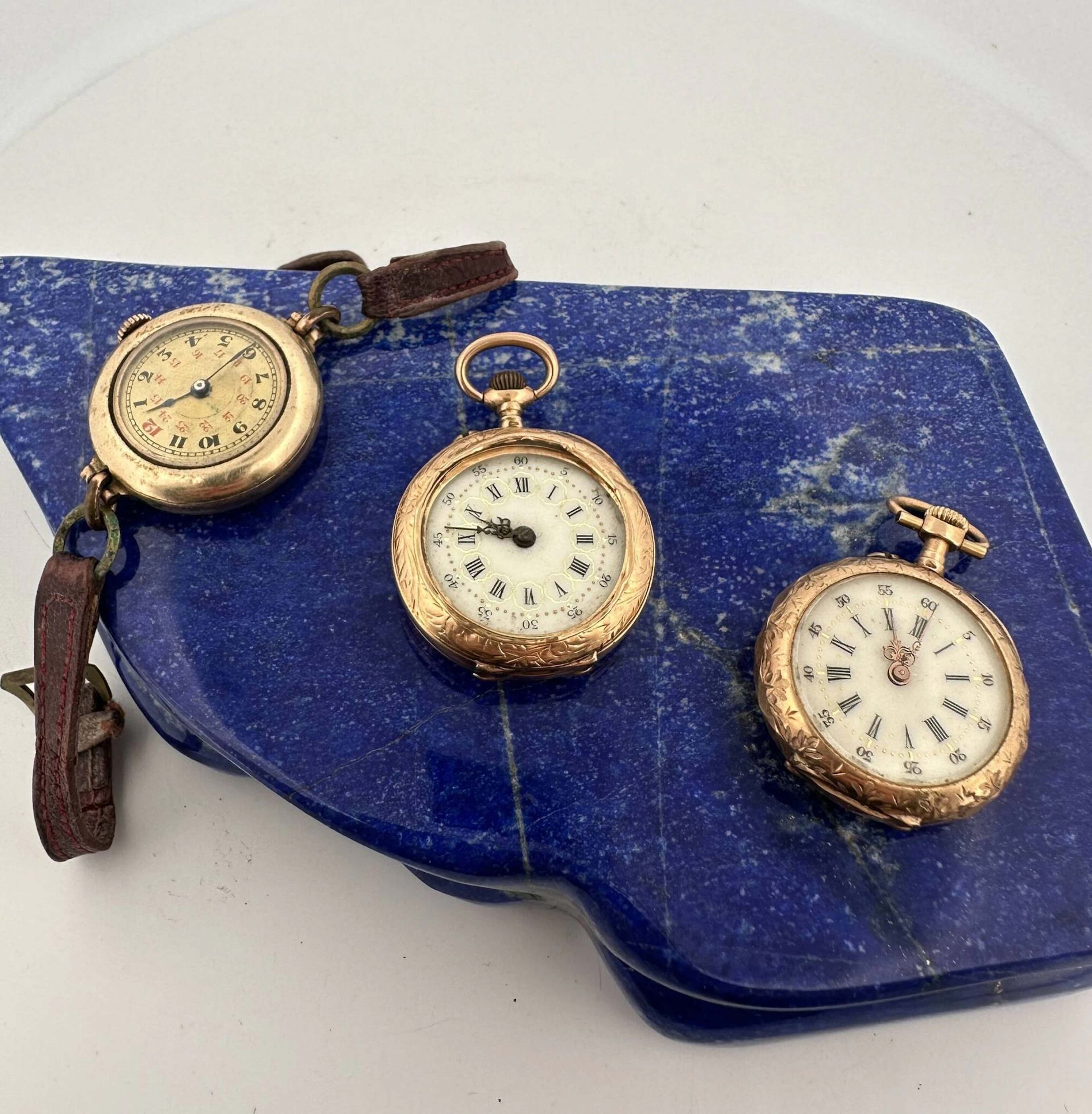 Set of three pocket watches, including two in rose gold and - Lot 335