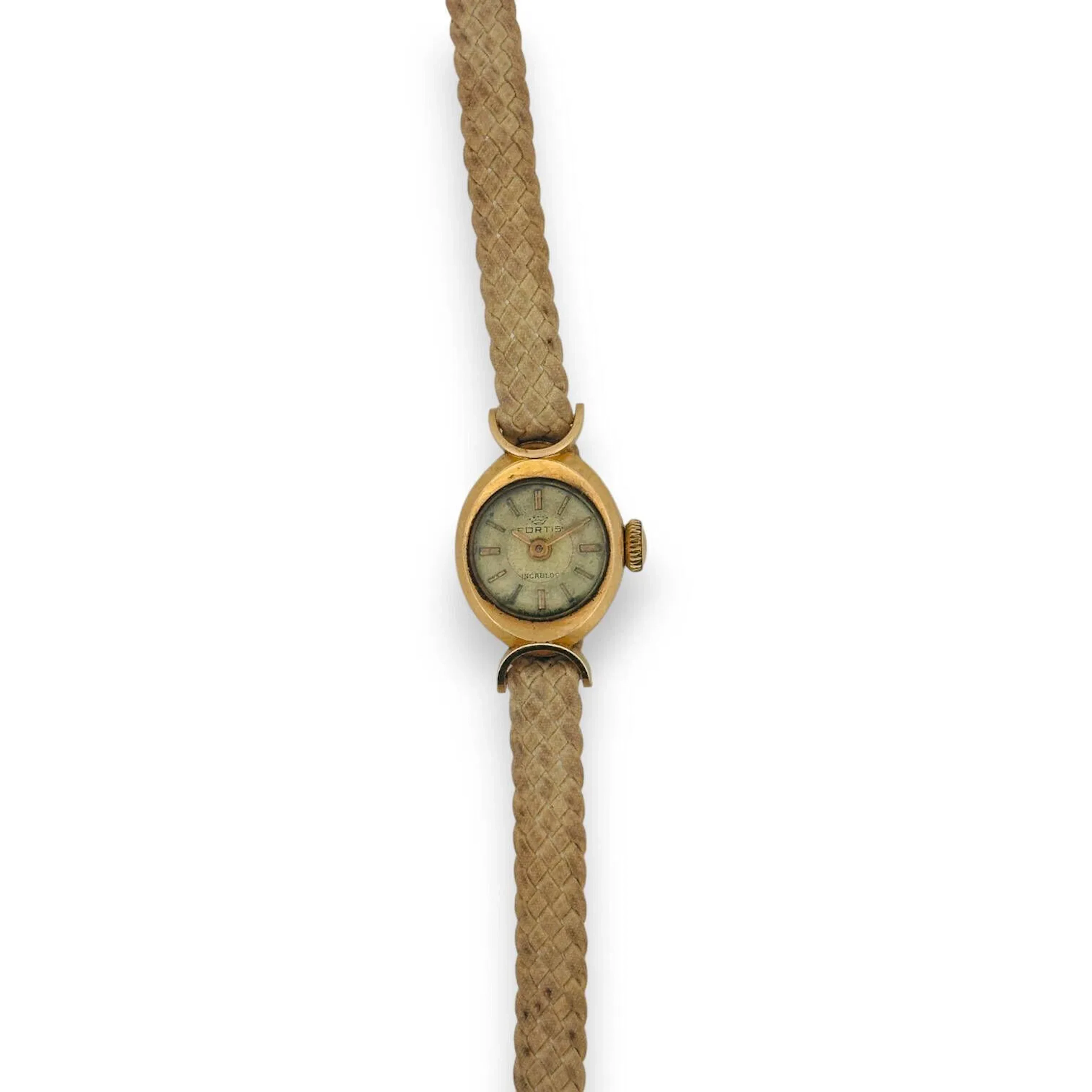 FORTIS Montre bracelet de dame, le boîtier en or 18k (750), la lunette ronde, index bâtons dorés, . Mouvement mécanique à remontoir. Bracelet en tissu tressé (état d'usage). Non fonctionnelle, révision à prévoir. Poids brut 7 g