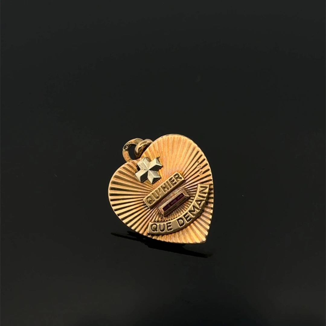 "Heart" pendant inscribed with "+ than yesterday and - than - Lot 301