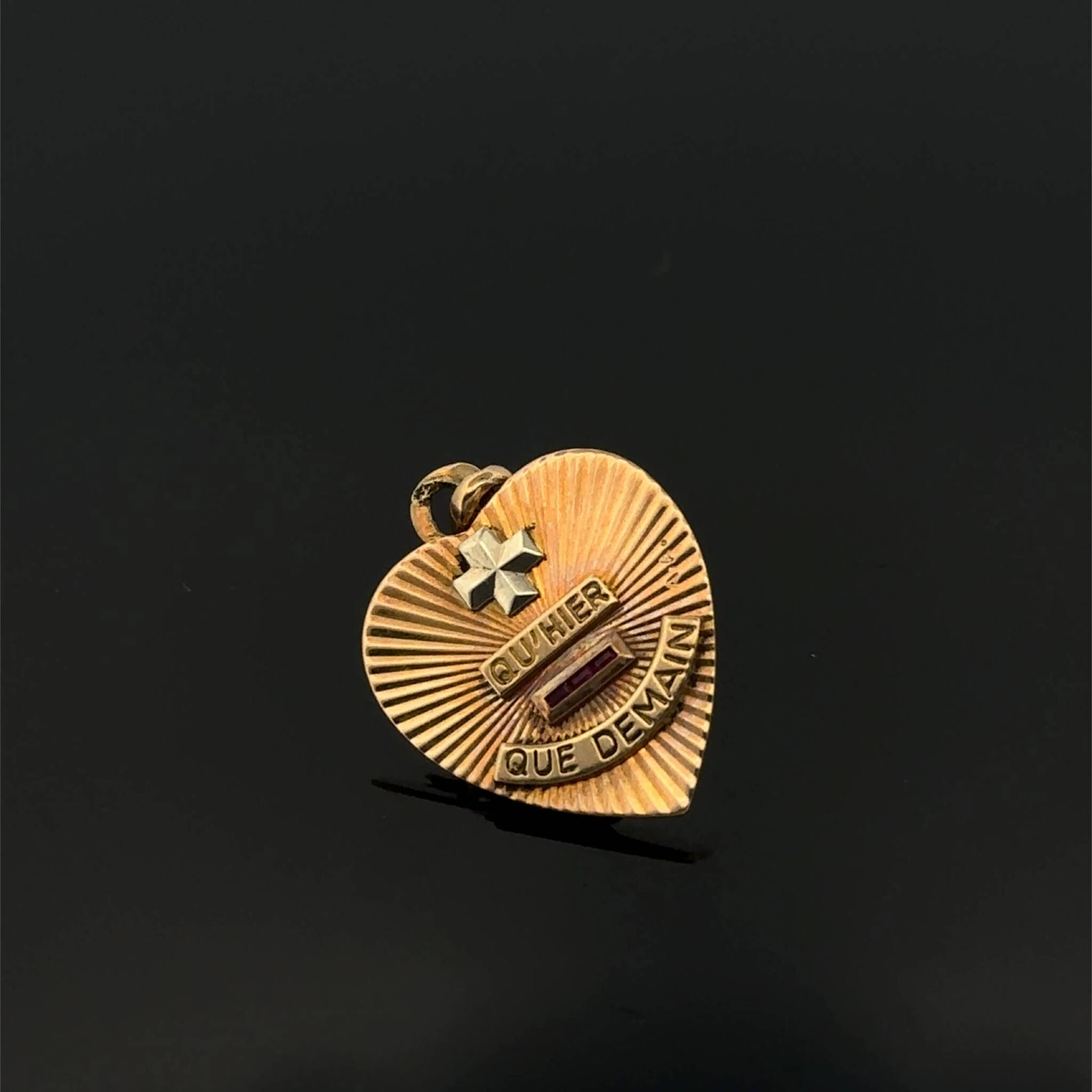 "Heart" pendant inscribed with "+ than yesterday and - than - Lot 301