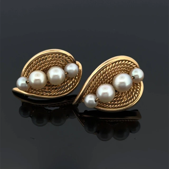 Pair of "leaf" earrings in openwork, twisted yellow gold (75 - Lot 208