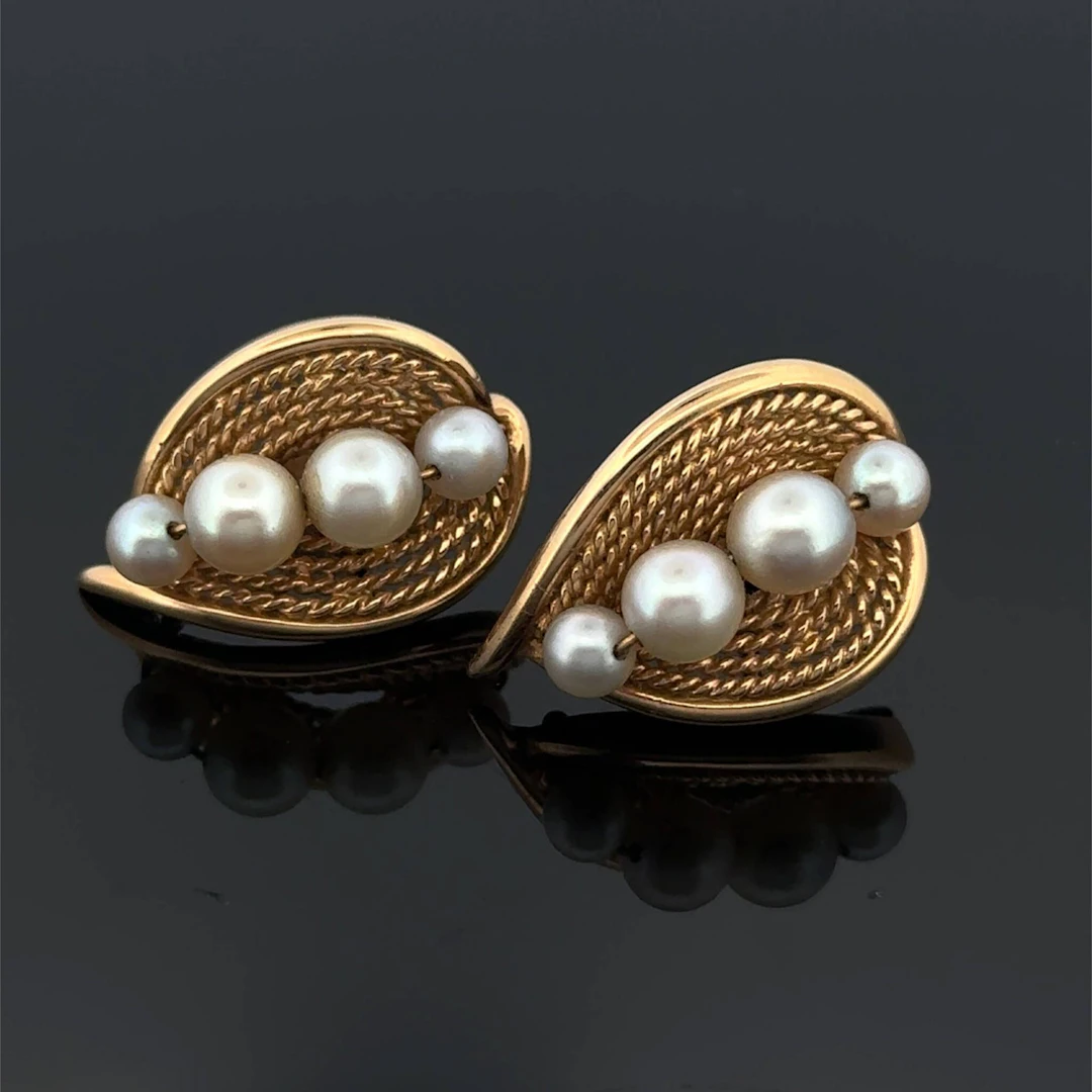 Pair of "leaf" earrings in openwork, twisted yellow gold (75 - Lot 208