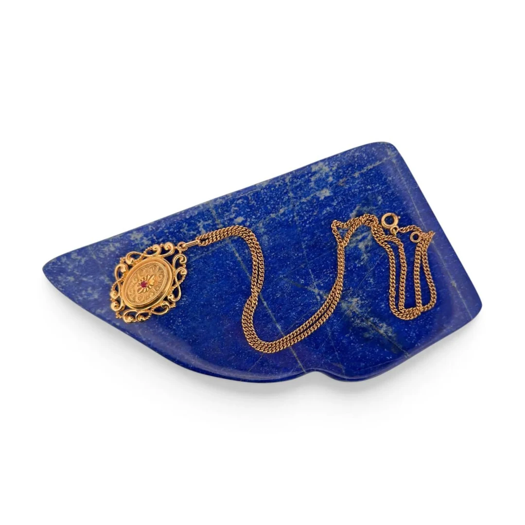 "Volutes" pendant with a yellow gold (750) chain set with a - Lot 129