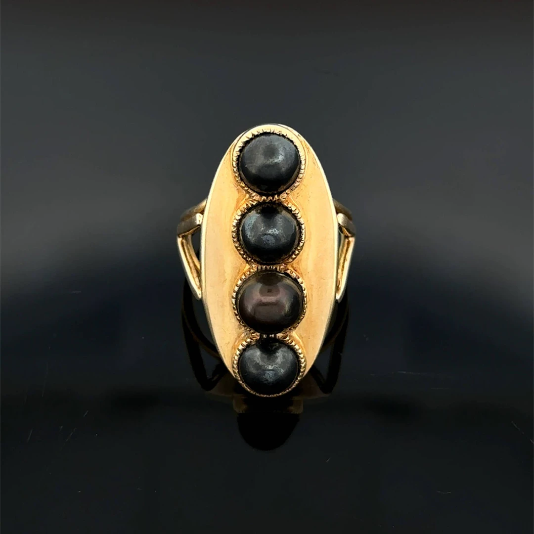 "Oblong" ring in yellow gold (750) set with four Tahitian cu - Lot 144