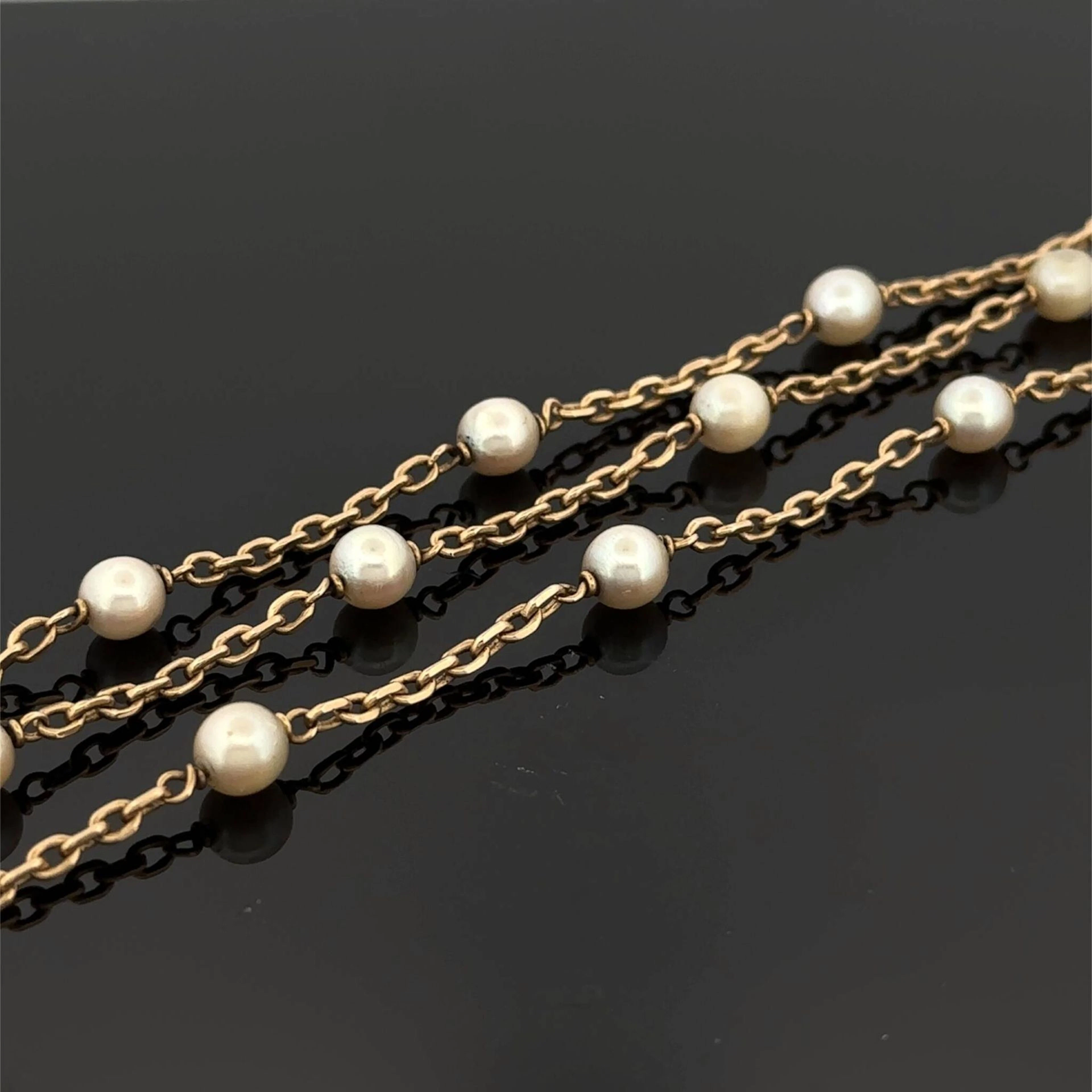 Yellow gold (750) bracelet consisting of three chains holdin - Lot 167