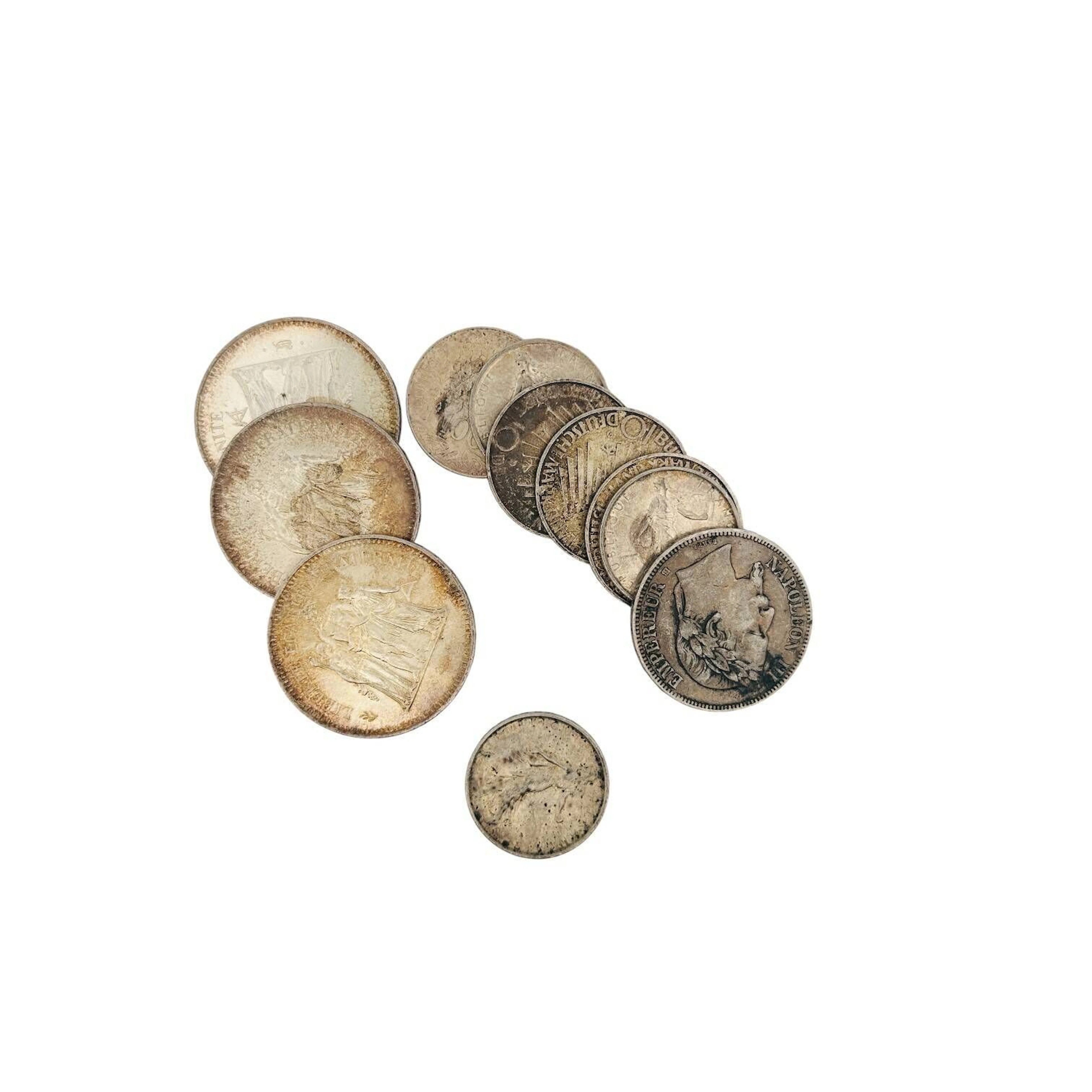 Lot de pièces en argent (900) et (835) comprenant : - 5 Francs Napoléon III tête laurée (1868,BB) - 3x50 Francs de type Hercule (2x1975; 1977) - 100 Francs commémorative (1983) - 3x5 Francs Semeuse (1960; 1962; 1964) Poids total : 165.86 g. On y joint 3 pièces en argent (635) de 10 deutsche mark Jeux Olympiques de Munich (3x 1972, D=Munich) Poids total : 46.47 g.