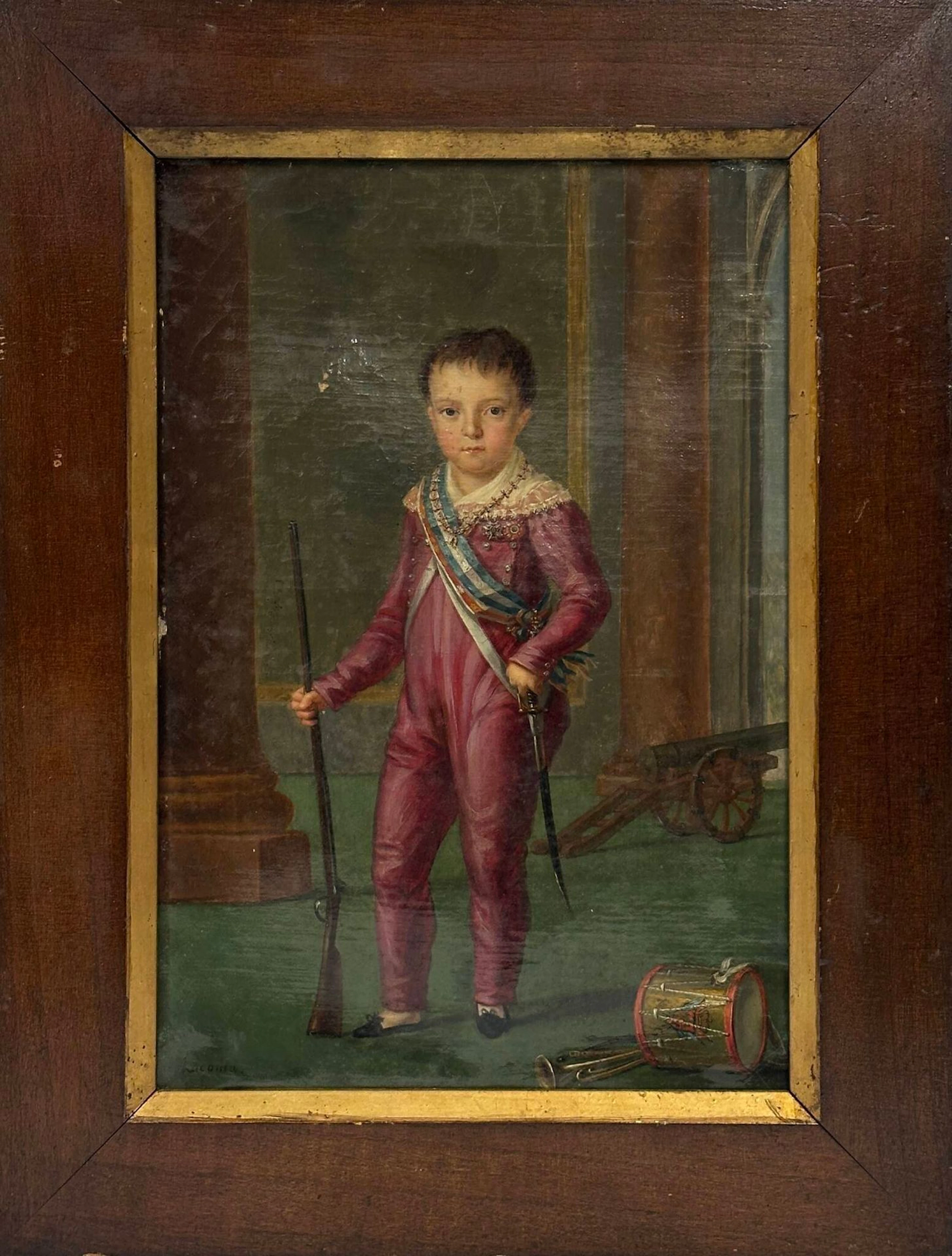 Francisco LACOMA Y FONTANET (Barcelone 1784 - 1849 Paris) Portrait de l'infant Carlos Luis de Borbón y Braganza (1818-1860), futur "comte de Montemolin", vers l'âge de 6 ans, jouant au soldat, avec un petit canon, fusil, épée et tambour Huile sur toile (toile d'origine) 34,5 cm x 24 cm. Signé en bas à gauche "Lacoma" Restaurations anciennes Carlos Luis de Borbón y Braganza (1818-1861), prince espagnol, était le fils de l’infant Carlos María Isidro de Borbón, prétendant carliste au trône d’Espagne, et de la princesse portugaise Maria Francisca de Bragança. Né à Port-Vendres, en exil après la chute de son grand-père Charles IV, il fut élevé dans un climat de piété, de légitimisme et de traditionalisme monarchique. Durant la Première Guerre carliste (1833-1840), il accompagna son père dans la lutte contre les usurpateurs libéraux, incarnant dès son adolescence l’espoir d’une restauration absolutiste. À la mort de son frère aîné, il devint l’héritier des droits carlistes et prit le titre de comte de Montemolín, reconnu comme Charles VI par ses partisans. Il tenta à plusieurs reprises de rallumer la cause carliste, notamment par l’expédition avortée de 1860, au cours de laquelle il fut capturé et contraint d’abdiquer sous la pression du gouvernement isabellin. Libéré, il revint sur son abdication, mais la cause carliste était déjà affaiblie par les divisions internes et la lassitude des partisans. Exilé à Trieste, il y mena une existence austère et mélancolique, marquée par la ferveur religieuse. Il mourut en 1861 laissant la succession carliste à son frère Juan de Borbón y Braganza, dans un climat apparent de crise dynastique et d’épuisement idéologique du mouvement, lequel connaîtra pourtant de nombreux autres épisodes. On connait un autre portrait du modèle enfant et posant avec une petite carabine, par un peintre anonyme conservé dans les collections royales espagnoles, au Palais Royal de Riofrio (inv. inconnu).