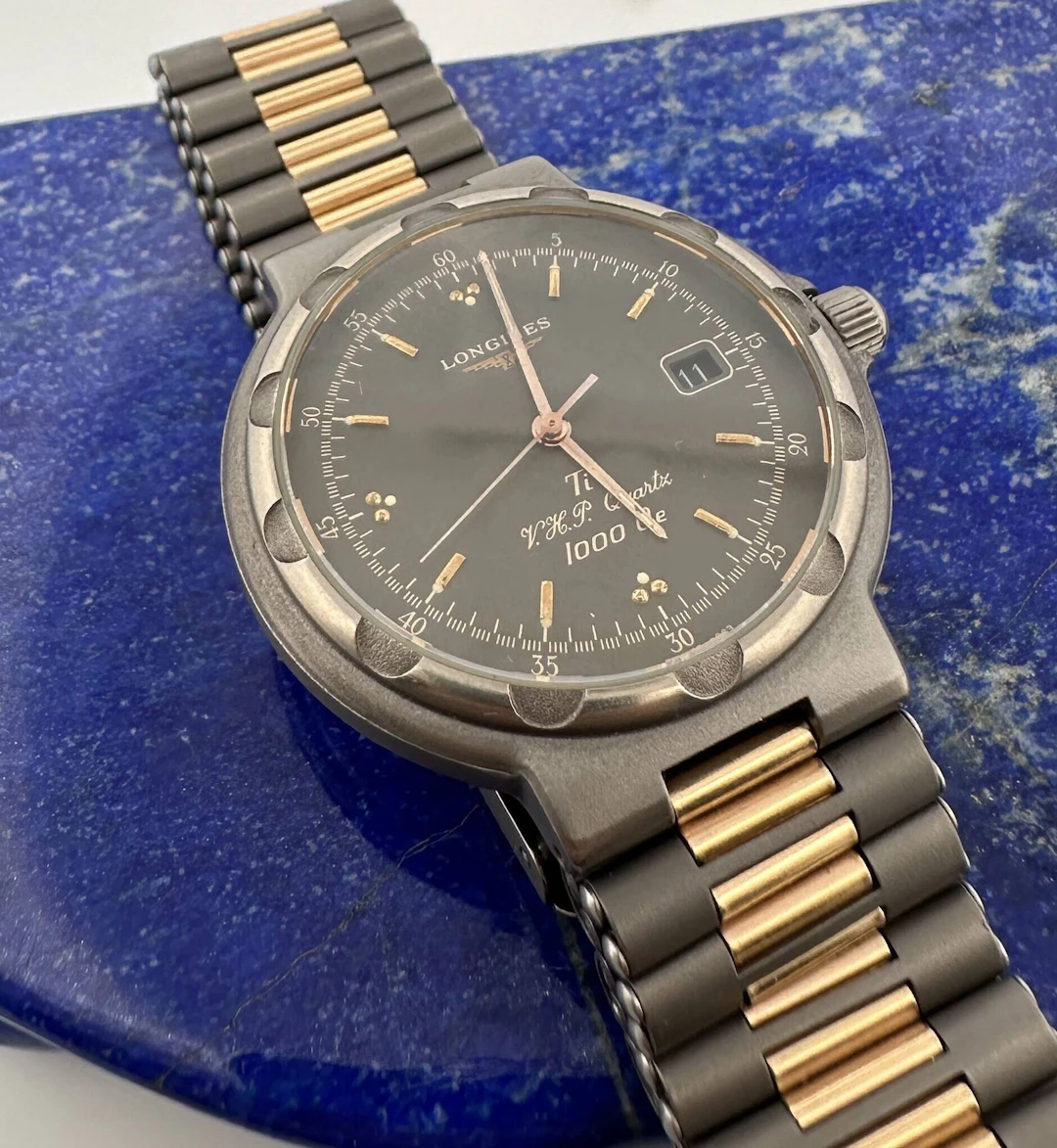 LONGINES CONQUEST TITANIUM VERY HIGH PRECISION QUARTZ 1000 O - Lot 172
