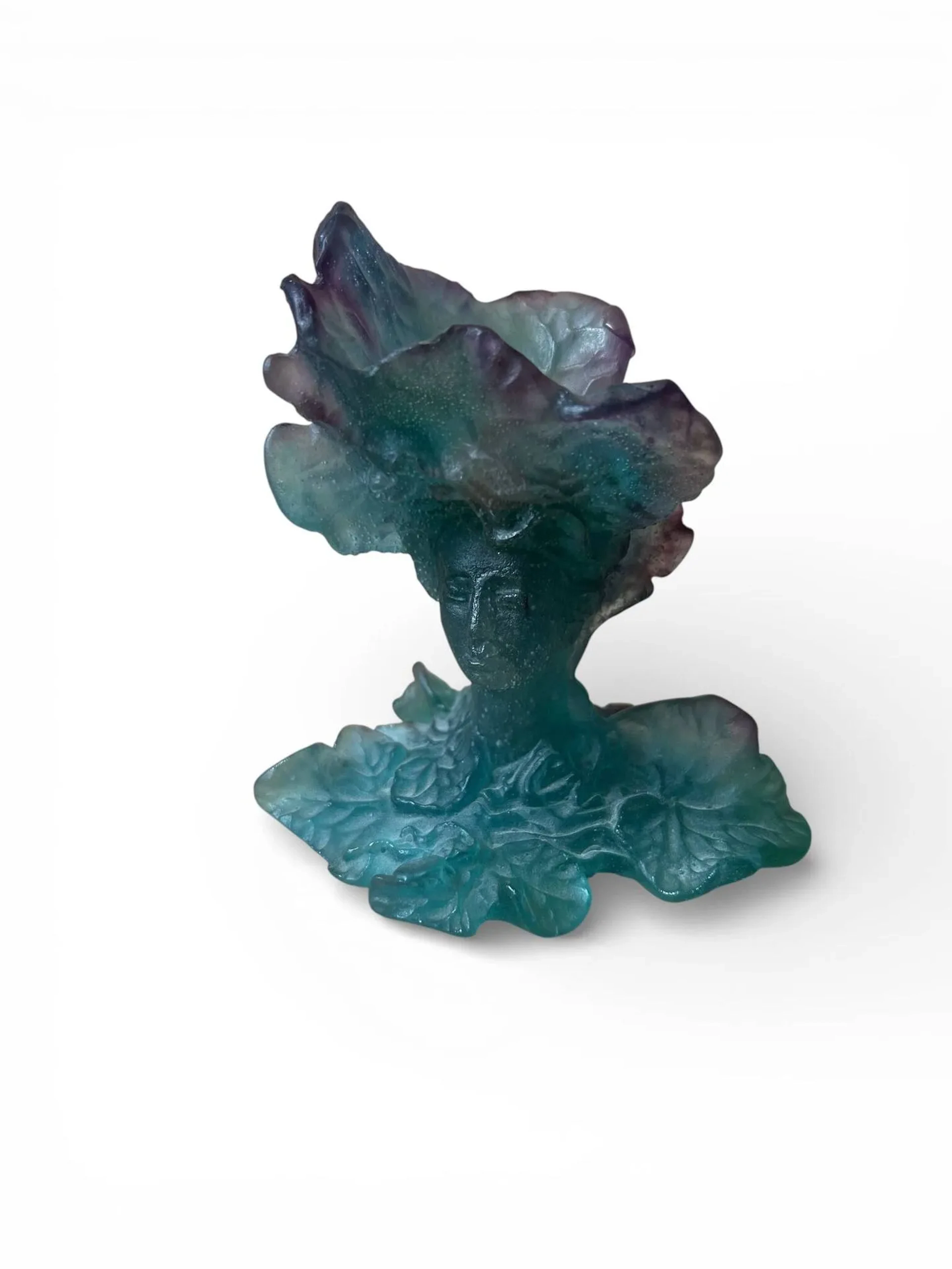 DAUM FRANCE Bacchus, pied de vase en pâte de verre figurant un visage parmi les feuilles de vignes et grappes de raisin Marque sous la base, petit éclat Ht. : 12 cm