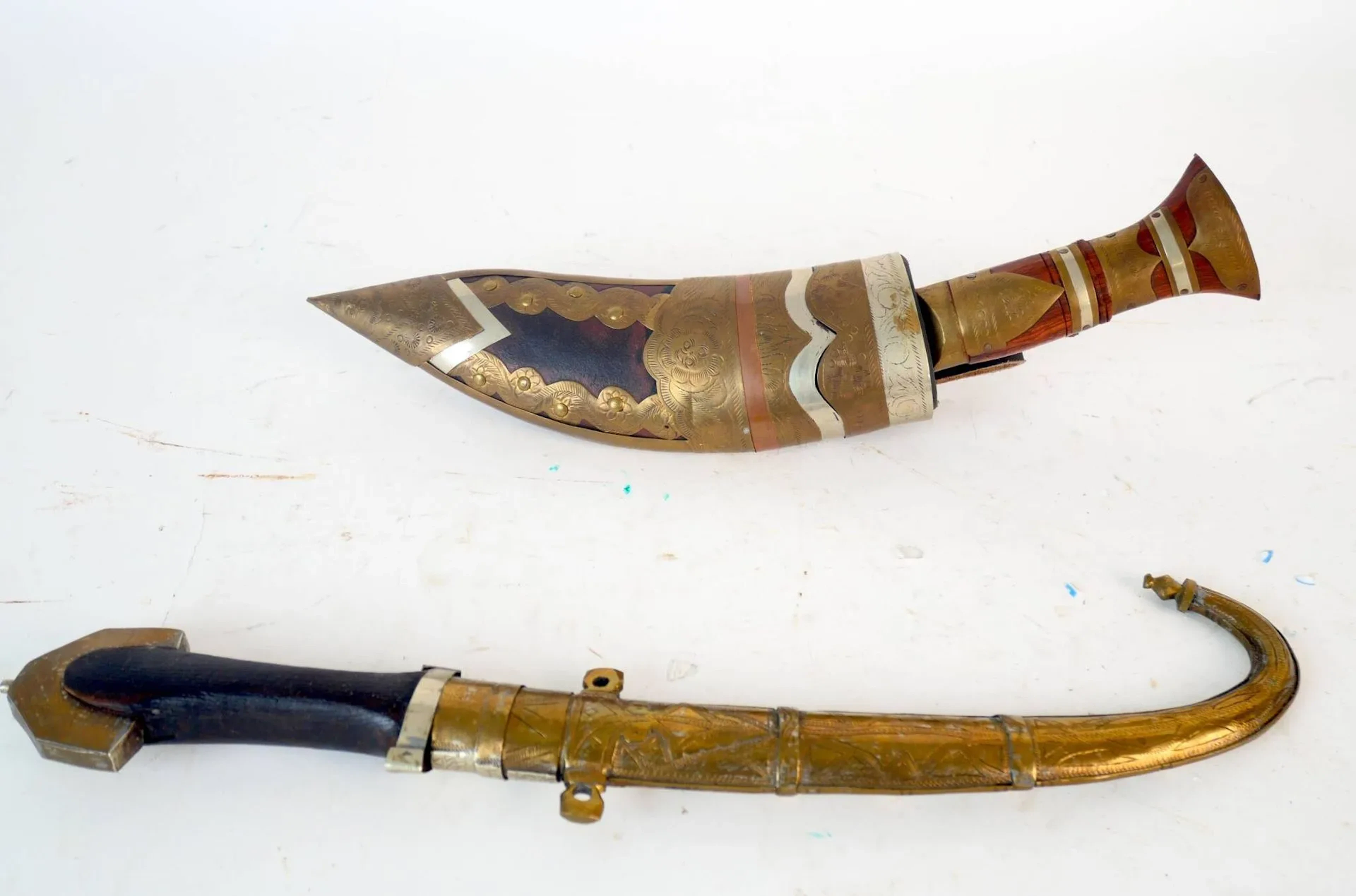 Two oriental knives with steel blades, including a kukri, fe - Lot 54