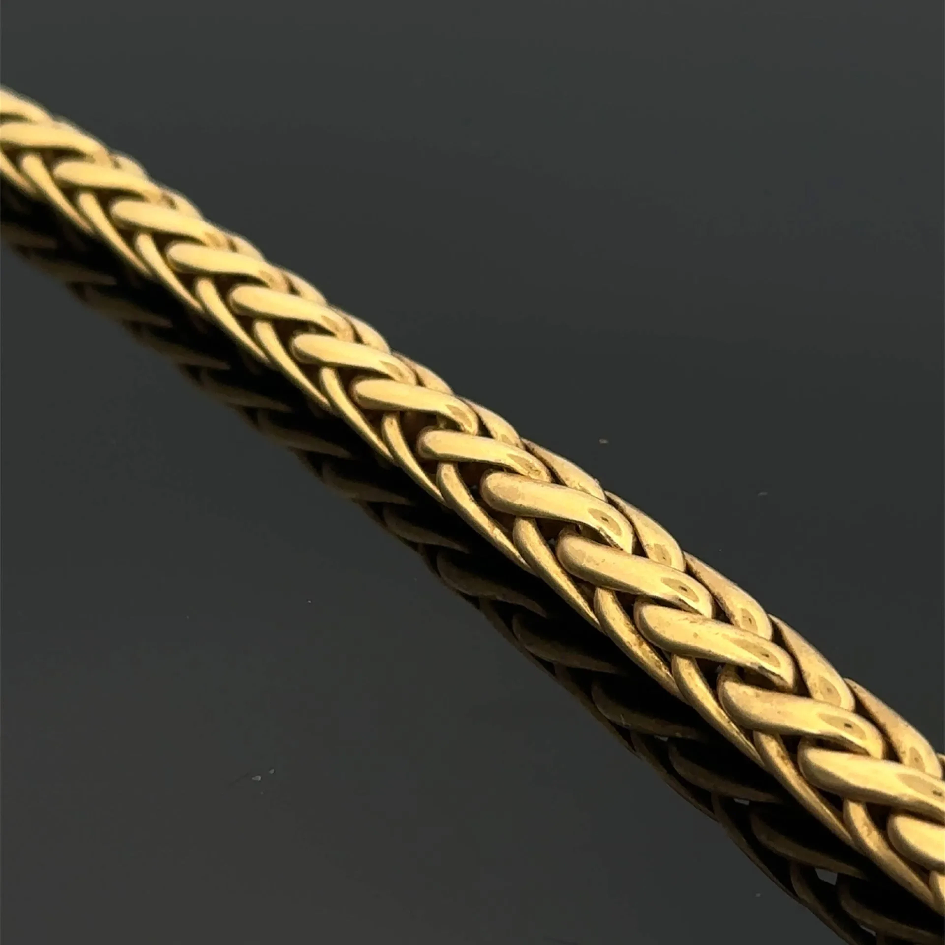 Yellow gold (750) necklace with a cascading palm-leaf link d - Lot 181