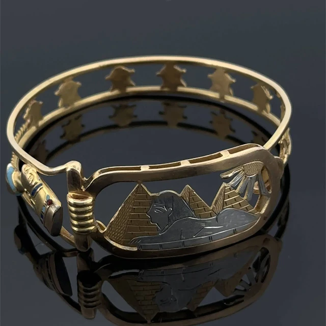 A rigid, clasp-style bracelet in yellow and white gold (750) - Lot 203