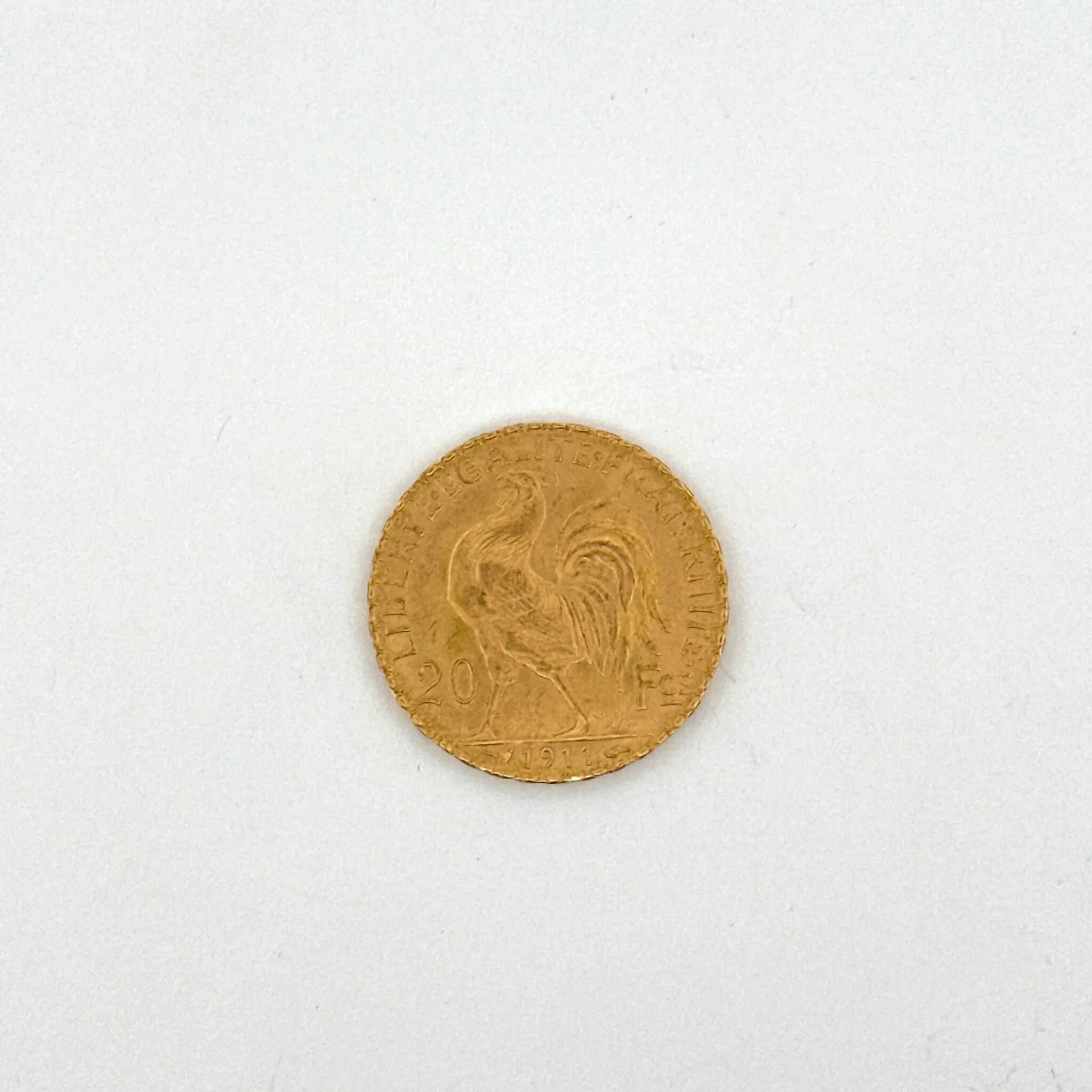 1911 20-franc gold "Rooster" coin. - Lot 173